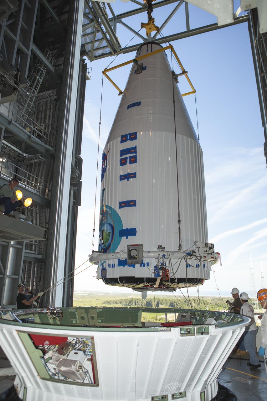 CAPE CANAVERAL, Fla. – At Cape Canaveral Air Force Station's Vertical Integration Facility at Launch Complex 41, NASA's Tracking and Data Relay Satellite, or TDRS-L, spacecraft is lifted for mounting atop a United Launch Alliance Atlas V rocket. The TDRS-L satellite will be a part of the second of three next-generation spacecraft designed to ensure vital operational continuity for the NASA Space Network. It is scheduled to launch from Cape Canaveral's Space Launch Complex 41 atop a United Launch Alliance Atlas V rocket on Jan. 23, 2014. The current Tracking and Data Relay Satellite system consists of eight in-orbit satellites distributed to provide near continuous information relay contact with orbiting spacecraft ranging from the International Space Station and Hubble Space Telescope to the array of scientific observatories. For more information, visit: http://www.nasa.gov/mission_pages/tdrs/home/index.html Photo credit: NASA/Dimitri Gerondidakis