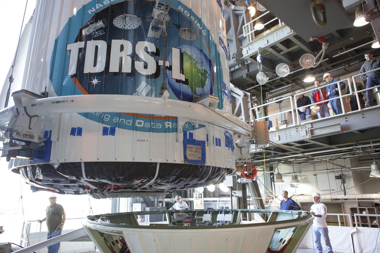 CAPE CANAVERAL, Fla. – At Cape Canaveral Air Force Station's Vertical Integration Facility at Launch Complex 41, NASA's Tracking and Data Relay Satellite, or TDRS-L, spacecraft is moved into position for mating atop a United Launch Alliance Atlas V rocket. The TDRS-L satellite will be a part of the second of three next-generation spacecraft designed to ensure vital operational continuity for the NASA Space Network. It is scheduled to launch from Cape Canaveral's Space Launch Complex 41 atop a United Launch Alliance Atlas V rocket on Jan. 23, 2014. The current Tracking and Data Relay Satellite system consists of eight in-orbit satellites distributed to provide near continuous information relay contact with orbiting spacecraft ranging from the International Space Station and Hubble Space Telescope to the array of scientific observatories. For more information, visit: http://www.nasa.gov/mission_pages/tdrs/home/index.html Photo credit: NASA/Dimitri Gerondidakis