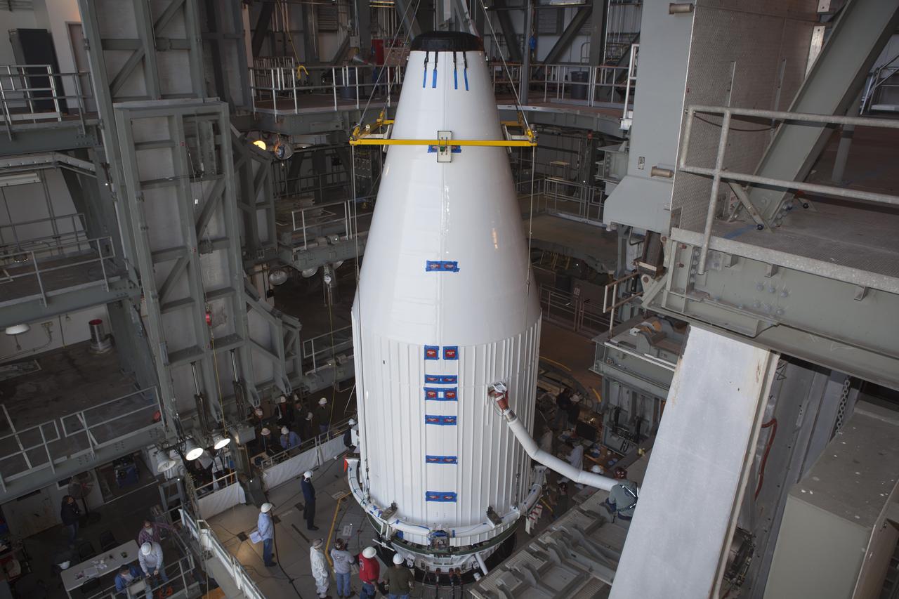 CAPE CANAVERAL, Fla. – At Cape Canaveral Air Force Station's Vertical Integration Facility at Launch Complex 41, engineers and technicians move NASA's Tracking and Data Relay Satellite, or TDRS-L, spacecraft into position for mating atop a United Launch Alliance Atlas V rocket. The TDRS-L satellite will be a part of the second of three next-generation spacecraft designed to ensure vital operational continuity for the NASA Space Network. It is scheduled to launch from Cape Canaveral's Space Launch Complex 41 atop a United Launch Alliance Atlas V rocket on Jan. 23, 2014. The current Tracking and Data Relay Satellite system consists of eight in-orbit satellites distributed to provide near continuous information relay contact with orbiting spacecraft ranging from the International Space Station and Hubble Space Telescope to the array of scientific observatories. For more information, visit: http://www.nasa.gov/mission_pages/tdrs/home/index.html Photo credit: NASA/Dimitri Gerondidakis