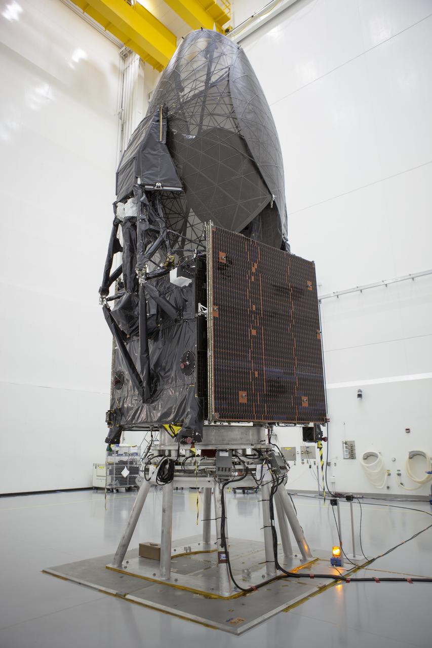 Inside the Astrotech payload processing facility in Titusville, NASA's Tracking and Data Relay Satellite, or TDRS-L, spacecraft is undergoing preflight processing.