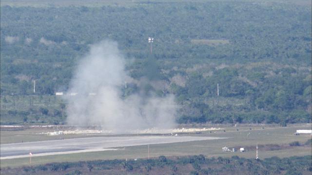 CAPE CANAVERAL, Fla. – The Project Morpheus prototype lander soars high and moves forward after launching on its third free flight test at the north end of the Shuttle Landing Facility at NASA’s Kennedy Space Center in Florida. The 57-second test began at 1:15 p.m. EST with the Morpheus lander launching from the ground over a flame trench and ascending about 187 feet, nearly doubling the target ascent velocity from the last test in December 2013. The lander flew forward, covering about 154 feet in 20 seconds before descending and landing within 11 inches of its target on a dedicated pad inside the autonomous landing and hazard avoidance technology, or ALHAT, hazard field. Project Morpheus tests NASA’s ALHAT and an engine that runs on liquid oxygen and methane, or green propellants, into a fully-operational lander that could deliver cargo to other planetary surfaces. The landing facility provides the lander with the kind of field necessary for realistic testing, complete with rocks, craters and hazards to avoid. Morpheus’ ALHAT payload allows it to navigate to clear landing sites amidst rocks, craters and other hazards during its descent. Project Morpheus is being managed under the Advanced Exploration Systems, or AES, Division in NASA’s Human Exploration and Operations Mission Directorate. The efforts in AES pioneer new approaches for rapidly developing prototype systems, demonstrating key capabilities and validating operational concepts for future human missions beyond Earth orbit. For more information on Project Morpheus, visit http://www.nasa.gov/centers/johnson/exploration/morpheus. Photo credit: NASA/Frankie Martin