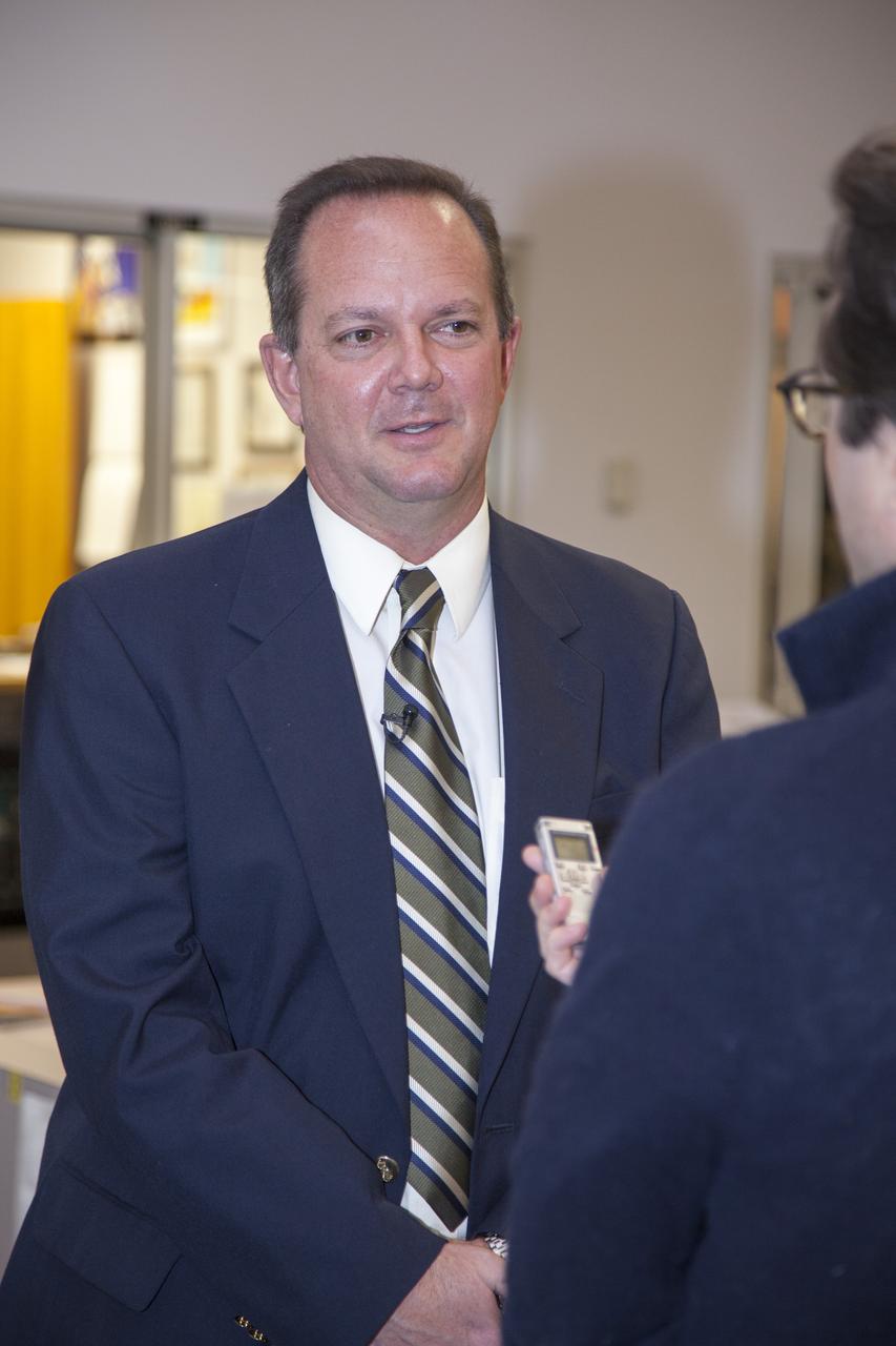 CAPE CANAVERAL, Fla. – Tom Engler, the deputy director of the Center Planning and Development Directorate at NASA’s Kennedy Space Center in Florida, speaks to reporter James Dean from Florida Today newspaper during an interview at the Kennedy News Center. Kennedy Space Center is working with private industry in new and innovative ways as the agency's premier launch center adapts to changing spaceflight, research and exploration goals in America. Opportunities are rich and varied, ranging from working with the private launch industry, to involvement with NASA's expendable launch vehicles programs to beginning or participating in research in a number of advancing fields. For more information on CPDD, visit http://www.nasa.gov/centers/kennedy/business/index.html. Photo credit: NASA/Daniel Casper