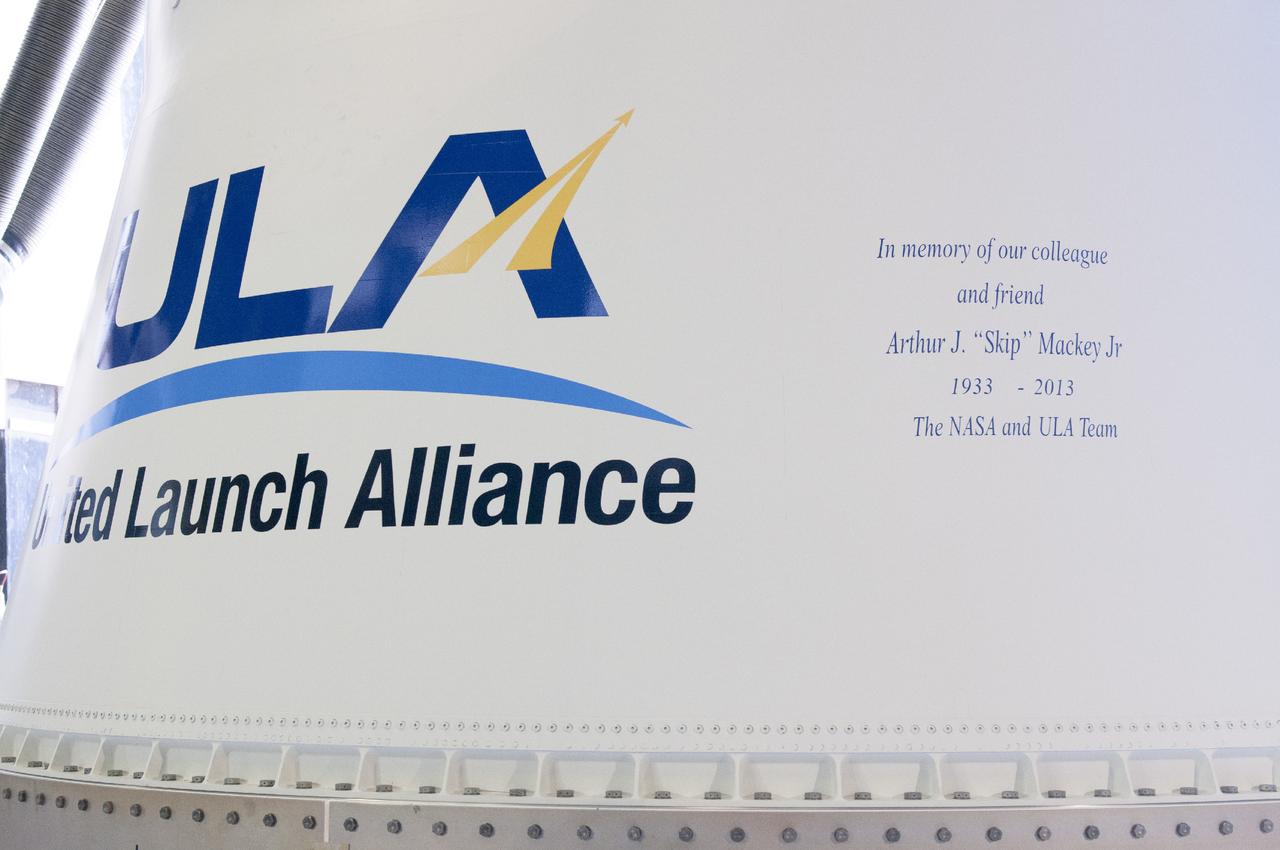 CAPE CANAVERAL, Fla. – This memorial message was added to the Atlas V rocket for NASA's Tracking and Data Relay Satellite, or TDRS-L, spacecraft being prepared for launch from Cape Canaveral Air Force Station's Launch Complex 41. Arthur J. "Skip" Mackey Jr. was the “Voice of NASA” during the 1960s, 1970s and early 1980s for flight commentary after liftoff for expendable vehicles launched from Cape Canaveral. Mackey served as branch chief for Telemetry and Communications at Hangar AE in the agency’s Expendable Launch Vehicle Program and then the Launch Services Program for 39 years. He died in Fort Lauderdale, Fla., on Nov. 19, 2013. The TDRS-L spacecraft is the second of three new satellites designed to ensure vital operational continuity for NASA by expanding the lifespan of the Tracking and Data Relay Satellite System TDRSS fleet, which consists of eight satellites in geosynchronous orbit. The spacecraft provide tracking, telemetry, command and high bandwidth data return services for numerous science and human exploration missions orbiting Earth. These include NASA's Hubble Space Telescope and the International Space Station. TDRS-L has a high-performance solar panel designed for more spacecraft power to meet the growing S-band communications requirements. TDRSS is one of NASA Space Communication and Navigation’s SCaN three networks providing space communications to NASA’s missions. For more information more about TDRS-L, visit: http://www.nasa.gov/tdrs To learn more about SCaN, visit: www.nasa.gov/scan For more on "Skip" Mackey go to: http://www.nasa.gov/content/skip-mackey-remembered-by-colleagues-as-voice-of-nasa/ Image credit: United Launch Alliance