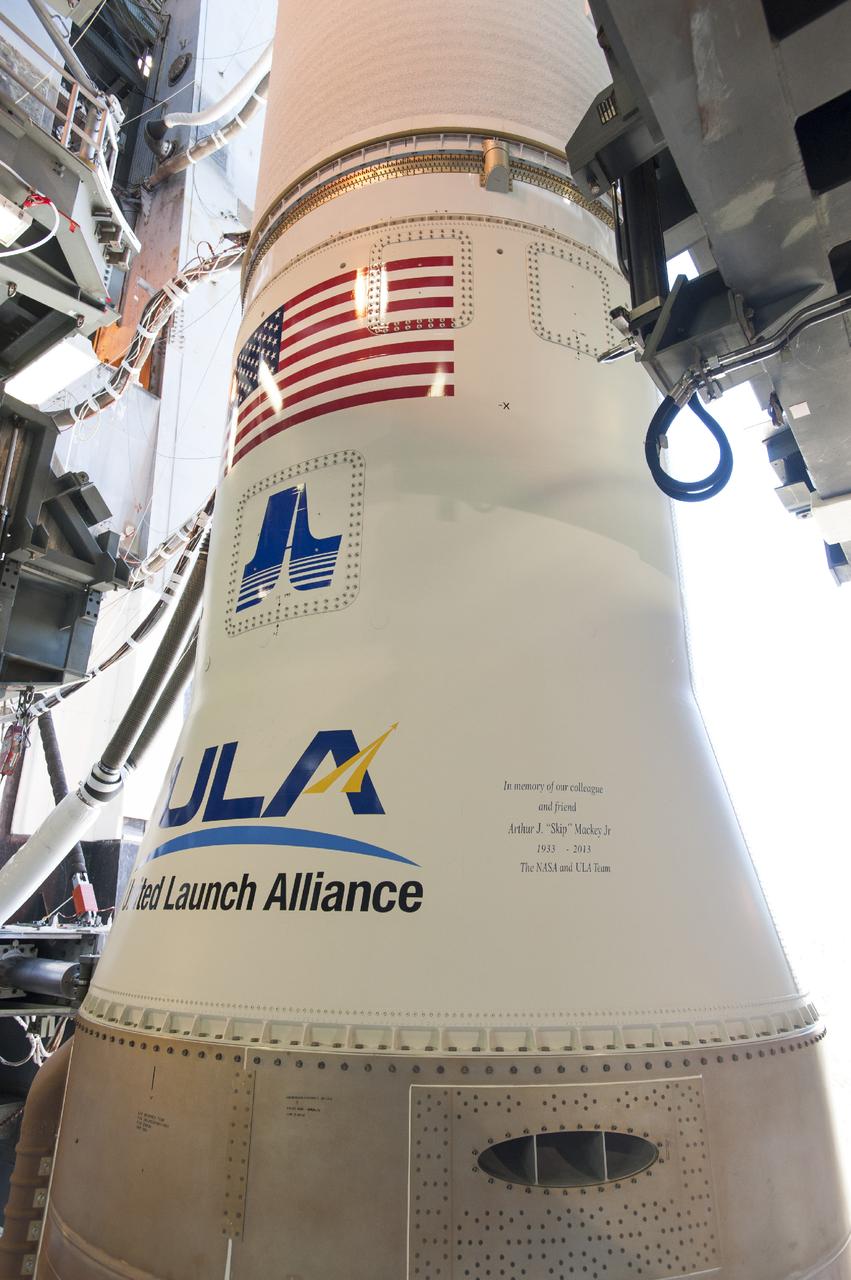 CAPE CANAVERAL, Fla. – This memorial message was added to the Atlas V rocket for NASA's Tracking and Data Relay Satellite, or TDRS-L, spacecraft being prepared for launch from Cape Canaveral Air Force Station's Launch Complex 41. Arthur J. "Skip" Mackey Jr. was the “Voice of NASA” during the 1960s, 1970s and early 1980s for flight commentary after liftoff for expendable vehicles launched from Cape Canaveral. Mackey served as branch chief for Telemetry and Communications at Hangar AE in the agency’s Expendable Launch Vehicle Program and then the Launch Services Program for 39 years. He died in Fort Lauderdale, Fla., on Nov. 19, 2013. The TDRS-L spacecraft is the second of three new satellites designed to ensure vital operational continuity for NASA by expanding the lifespan of the Tracking and Data Relay Satellite System TDRSS fleet, which consists of eight satellites in geosynchronous orbit. The spacecraft provide tracking, telemetry, command and high bandwidth data return services for numerous science and human exploration missions orbiting Earth. These include NASA's Hubble Space Telescope and the International Space Station. TDRS-L has a high-performance solar panel designed for more spacecraft power to meet the growing S-band communications requirements. TDRSS is one of NASA Space Communication and Navigation’s SCaN three networks providing space communications to NASA’s missions. For more information more about TDRS-L, visit: http://www.nasa.gov/tdrs To learn more about SCaN, visit: www.nasa.gov/scan For more on "Skip" Mackey go to: http://www.nasa.gov/content/skip-mackey-remembered-by-colleagues-as-voice-of-nasa/ Image credit: United Launch Alliance