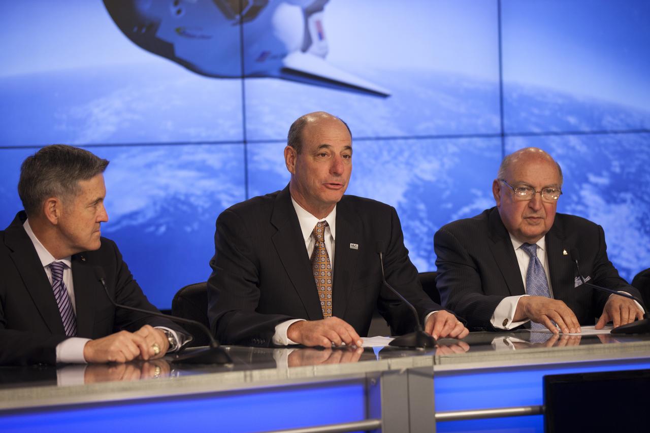 CAPE CANAVERAL, Fla. – Michael Gass, president and CEO of United Launch Alliance, or ULA, joins Sierra Nevada Corporation, or SNC, Space Systems, as the company announces the steps it will take to prepare for a November 2016 orbital flight of its Dream Chaser spacecraft from Florida’s Space Coast. The steps are considered substantial for SNC and important to plans by NASA and Space Florida for Kennedy Space Center’s transformation into a multi-user spaceport for both commercial and government customers. SNC said it plans to work with ULA to launch the Dream Chaser spacecraft into orbit atop an Atlas V rocket from Space Launch Complex 41 at Cape Canaveral Air Force Station intends to land the winged spacecraft at Kennedy’s 3.5-mile long runway at the Shuttle Landing Facility lease office space at Exploration Park, right outside Kennedy’s gates and process the spacecraft in the high bay of the Operations and Checkout Building at Kennedy, with Lockheed Martin performing the work. Photo credit: NASA/Kim Shiflett