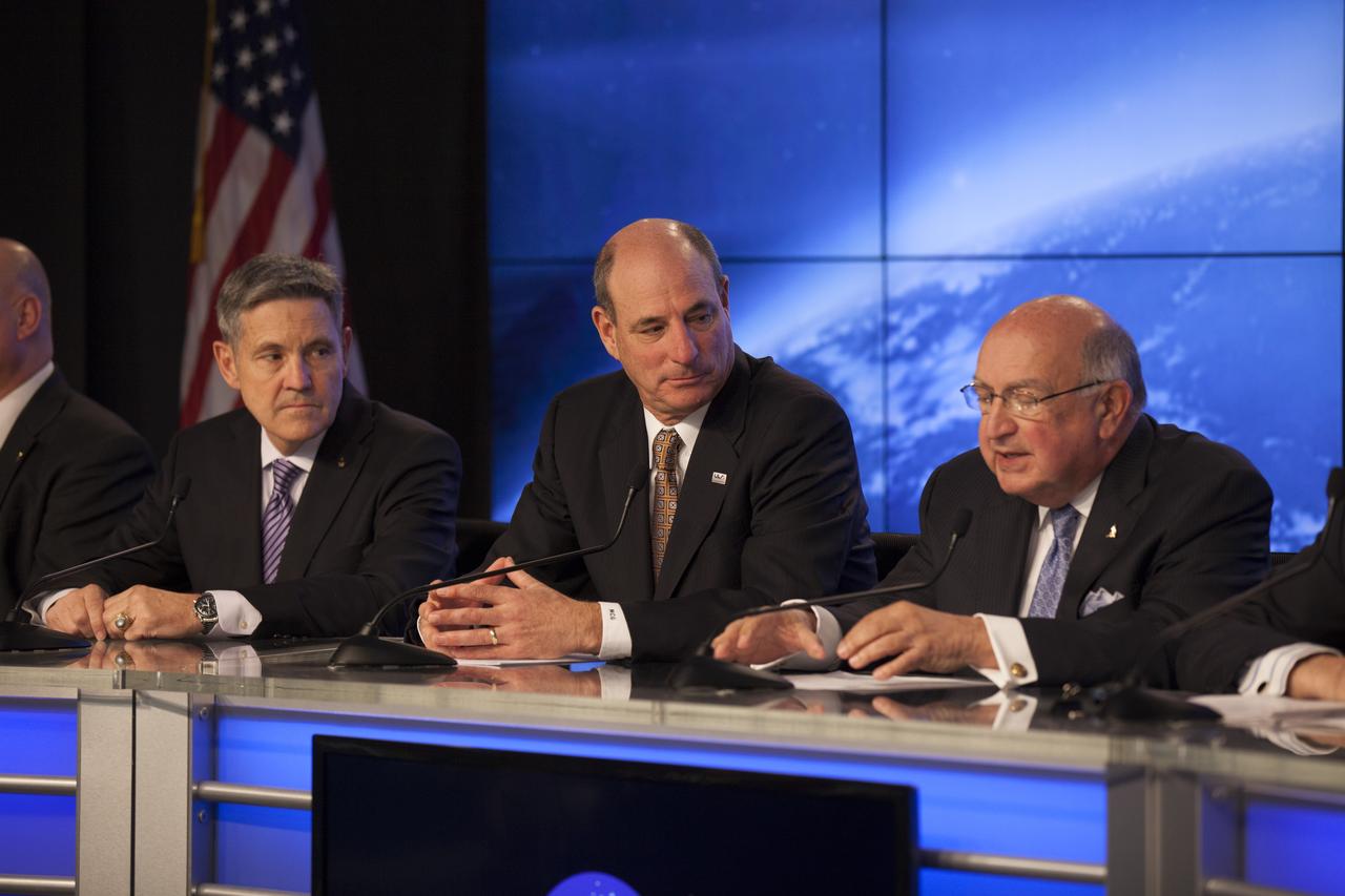 CAPE CANAVERAL, Fla. – Frank DiBello, right, president and CEO of Space Florida, joins Sierra Nevada Corporation, or SNC, Space Systems, as the company announces the steps it will take to prepare for a November 2016 orbital flight of its Dream Chaser spacecraft from Florida’s Space Coast. The steps are considered substantial for SNC and important to plans by NASA and Space Florida for Kennedy Space Center’s transformation into a multi-user spaceport for both commercial and government customers. SNC said it plans to work with United Launch Alliance, or ULA, to launch the Dream Chaser spacecraft into orbit atop an Atlas V rocket from Space Launch Complex 41 at Cape Canaveral Air Force Station intends to land the winged spacecraft at Kennedy’s 3.5-mile long runway at the Shuttle Landing Facility lease office space at Exploration Park, right outside Kennedy’s gates and process the spacecraft in the high bay of the Operations and Checkout Building at Kennedy, with Lockheed Martin performing the work. Photo credit: NASA/Kim Shiflett