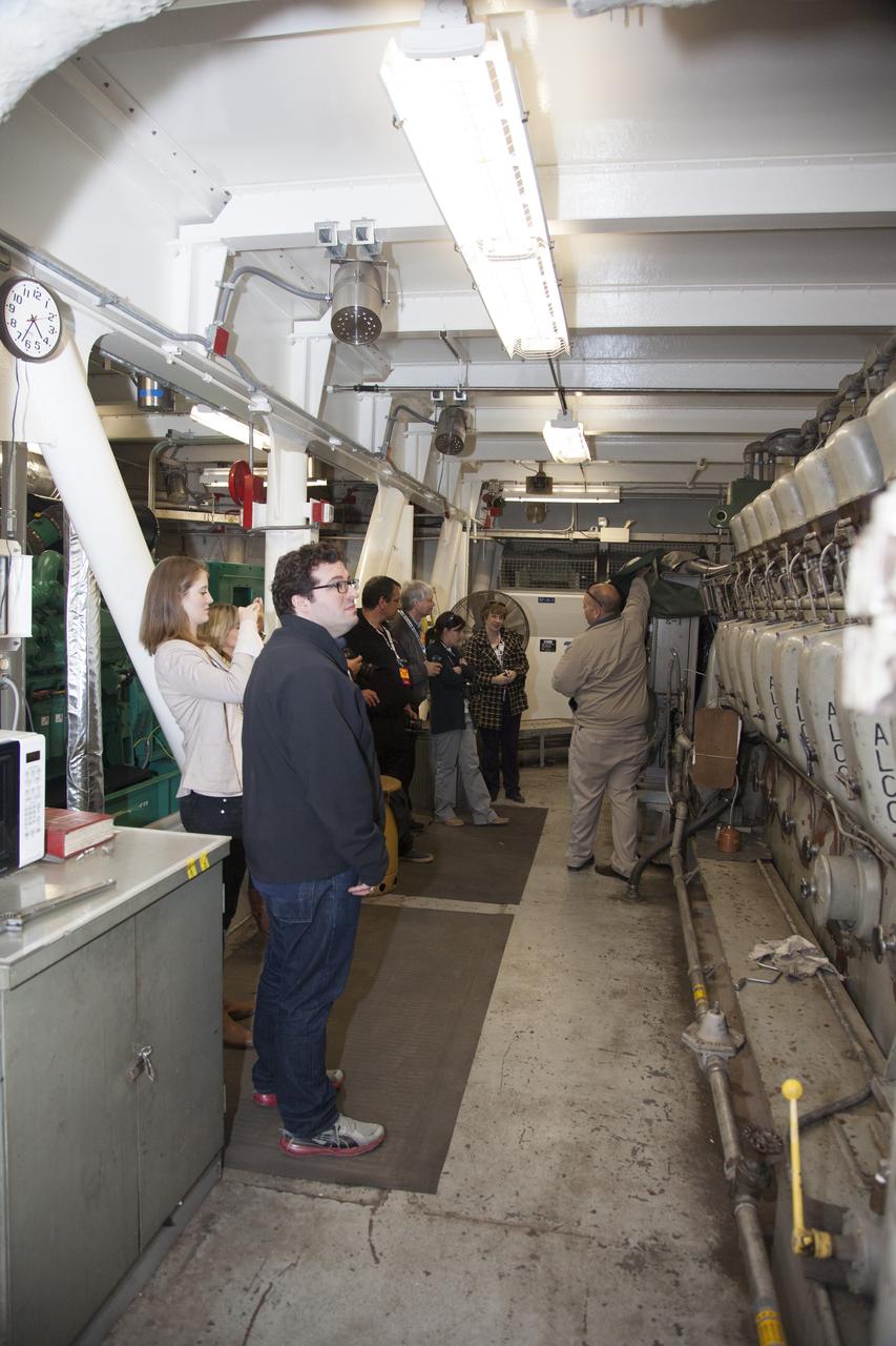 CAPE CANAVERAL, Fla. -- At NASA's Kennedy Space Center in Florida, social media participants were given an up-close look at the interior of one of the spaceport's mammoth crawler-transporters. Recent work has included preparations to install upgraded components that will enable the crawler to carry the greater loads anticipated with the agency's new rocket designed to take astronauts beyond low-Earth orbit for the first time since the early 1970s. The social media participants gathered at the Florida spaceport for the launch of the Tracking and Data Relay Satellite, or TDRS-L spacecraft. Their visit included tours of key facilities and participating in presentations by key NASA leaders who updated the space agency's current efforts. Photo credit: NASA/Dan Casper
