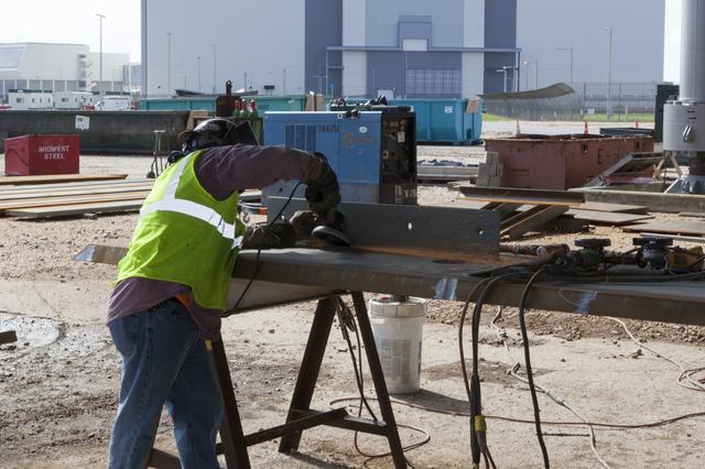 NASA image: Workers Welding on ML