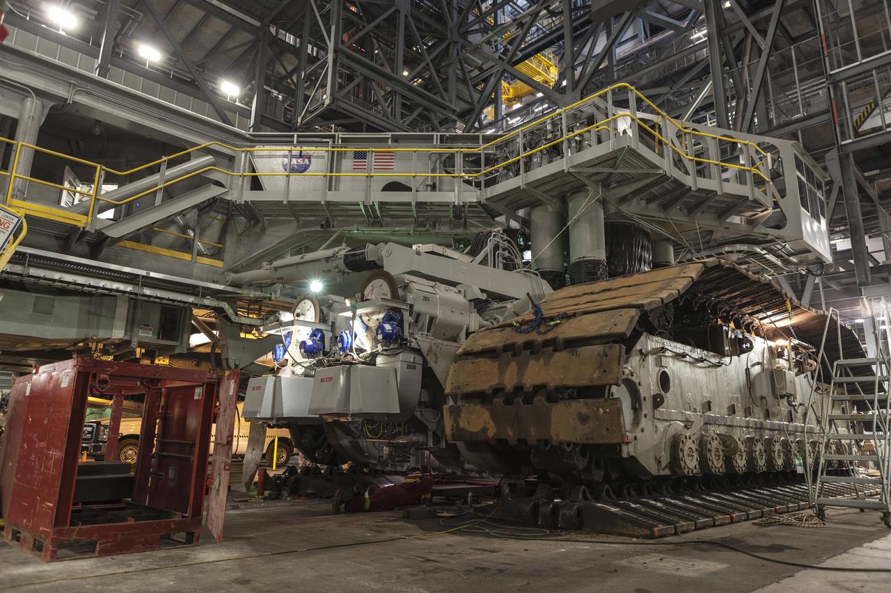 CAPE CANAVERAL, Fla. – Inside the Vehicle Assembly Building at NASA’s Kennedy Space Center in Florida, the B and D truck sections of crawler-transporter 2, or CT-2, are being raised up to prepare for installation of new roller bearing assemblies. Work continues in high bay 2 to upgrade CT-2. The modifications are designed to ensure CT-2’s ability to transport launch vehicles currently in development, such as the agency’s Space Launch System, to the launch pad. The Ground Systems Development and Operations Program office at Kennedy is overseeing the upgrades. For more than 45 years the crawler-transporters were used to transport the mobile launcher platform and the Apollo-Saturn V rockets and, later, space shuttles to Launch Pads 39A and B. For more information, visit: http://www.nasa.gov/exploration/systems/ground/crawler-transporter. Photo credit: NASA/Dimitri Gerondidakis  