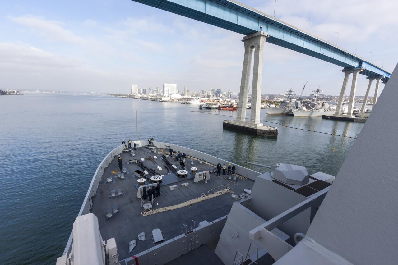 SAN DIEGO, Calif. – At the U.S. Naval Base San Diego in California, the USS San Diego heads out to sea with the Orion boilerplate test vehicle and other hardware in its well deck for an underway recovery test. About 100 miles offshore, NASA and the U.S. Navy conducted tests to prepare for recovery of the Orion crew module, forward bay cover and parachutes on its return from a deep space mission. The underway recovery test will allow the teams to demonstrate and evaluate the recovery processes, procedures, hardware and personnel in open waters. During the testing, the tether lines were unable to support the tension caused by crew module motion that was driven by wave turbulence in the well deck of the ship. NASA and the U.S. Navy are reviewing the testing data collected to evaluate the next steps. The Ground Systems Development and Operations Program conducted the underway recovery tests. Orion is the exploration spacecraft designed to carry astronauts to destinations not yet explored by humans, including an asteroid and Mars. It will have emergency abort capability, sustain the crew during space travel and provide safe re-entry from deep space return velocities. The first unpiloted test flight of the Orion is scheduled to launch in 2014 atop a Delta IV rocket and in 2017 on NASA’s Space Launch System rocket. For more information, visit http://www.nasa.gov/orion. Photo credit: NASA/Cory Huston  