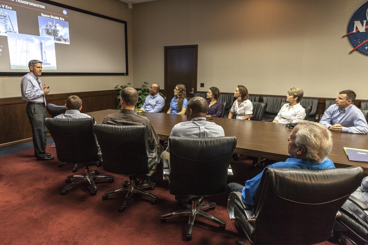 CAPE CANAVERAL, Fla. -- Kennedy Space Center Director Bob Cabana briefs members of the most recently selected group of NASA astronauts. The presentation covering operations at the Florida spaceport took place in the center's Headquarters Building. The astronaut class of 2013 was selected by NASA after an extensive year-and-a-half search. The new group will help the agency push the boundaries of exploration and travel to new destinations in the solar system. To learn more about the astronaut class of 2013, visit: http://www.nasa.gov/astronauts/2013astroclass.html Photo credit: NASA/Kim Shiflett
