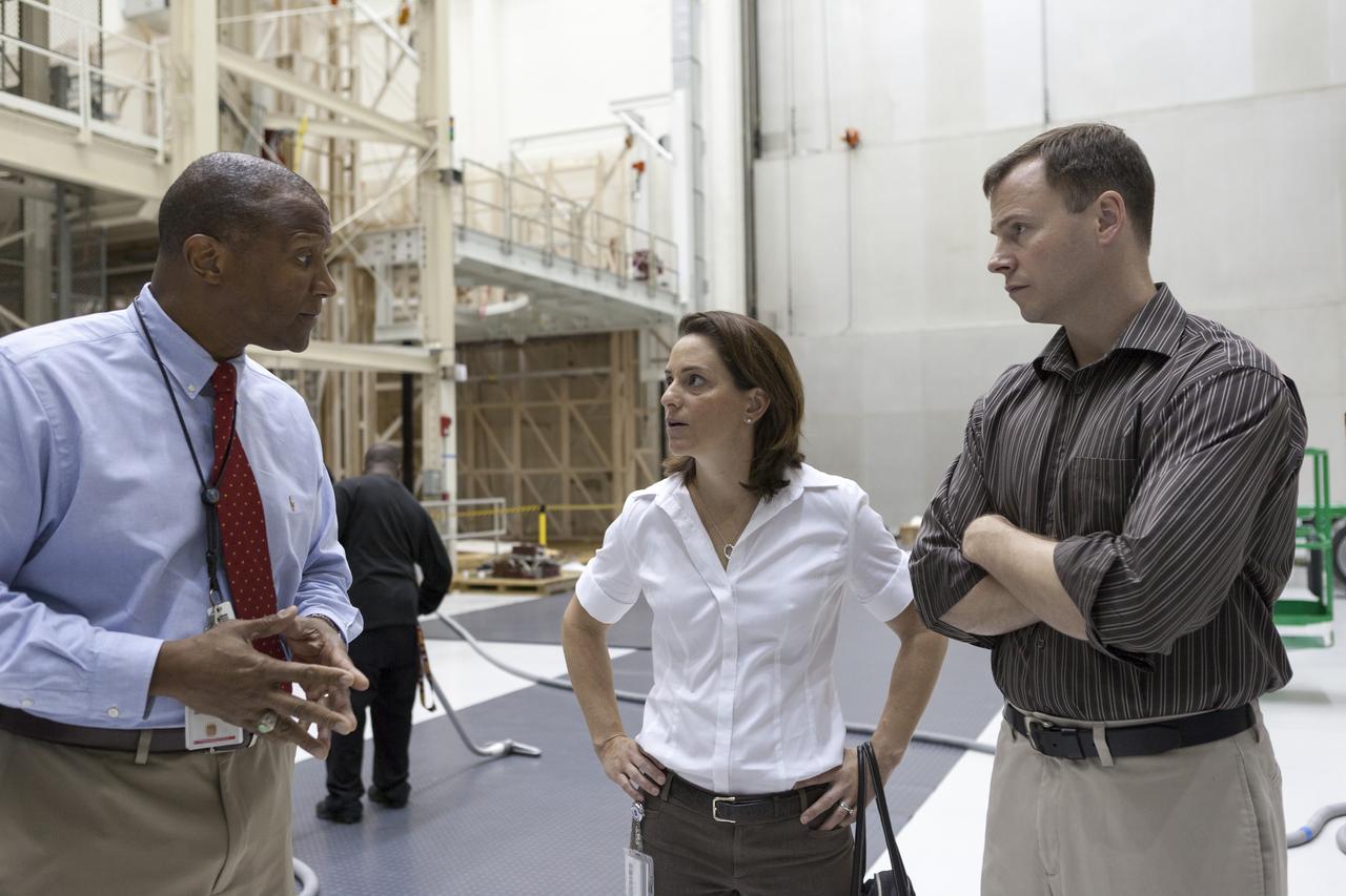 CAPE CANAVERAL, Fla. -- In the Operations and Checkout Building of NASA's Kennedy Space Center in Florida, associate center director Kelvin Manning, left, briefs astronaut candidates Nicole Mann, center, and Tyler Nick Hague on preparations for the launch the Orion spacecraft on Exploration Flight Test EFT-1. Plans call for the Lockheed Martin-built Orion to launch atop a United Launch Alliance Delta IV Heavy rocket from Cape Canaveral Air Force Station. The astronaut class of 2013 was selected by NASA after an extensive year-and-a-half search. The new group will help the agency push the boundaries of exploration and travel to new destinations in the solar system. To learn more about the astronaut class of 2013, visit: http://www.nasa.gov/astronauts/2013astroclass.html Photo credit: NASA/Kim Shiflett