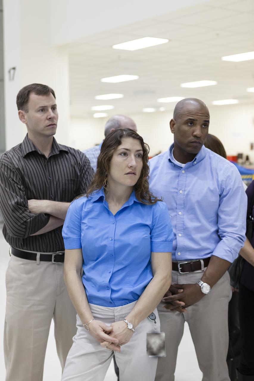 CAPE CANAVERAL, Fla. -- In the Operations and Checkout Building of NASA's Kennedy Space Center in Florida, astronaut candidates Tyler Nick Hague, left, Christina Hammock, center, and Victor Glover listen to a briefing on preparations for the launch the Orion spacecraft on Exploration Flight Test EFT-1. Plans call for the Lockheed Martin-built Orion to launch atop a United Launch Alliance Delta IV Heavy rocket from Cape Canaveral Air Force Station. The astronaut class of 2013 was selected by NASA after an extensive year-and-a-half search. The new group will help the agency push the boundaries of exploration and travel to new destinations in the solar system. To learn more about the astronaut class of 2013, visit: http://www.nasa.gov/astronauts/2013astroclass.html Photo credit: NASA/Kim Shiflett