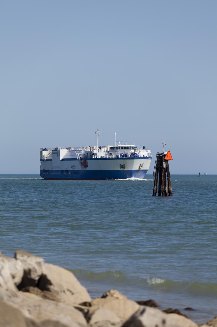 CAPE CANAVERAL, Fla. – The United Launch Alliance barge Delta Mariner enters Port Canaveral in Florida. The barge is carrying two of the booster stages for the Delta IV Heavy rocket slated for Orion's Exploration Flight Test-1, or EFT-1. Orion is the exploration spacecraft designed to carry astronauts to destinations not yet explored by humans. It will have emergency abort capability, sustain the crew during space travel and provide safe re-entry from deep-space return velocities. The first unpiloted test flight of Orion is scheduled to launch in September 2014 atop a Delta IV Heavy rocket and in 2017 on NASA’s Space Launch System 