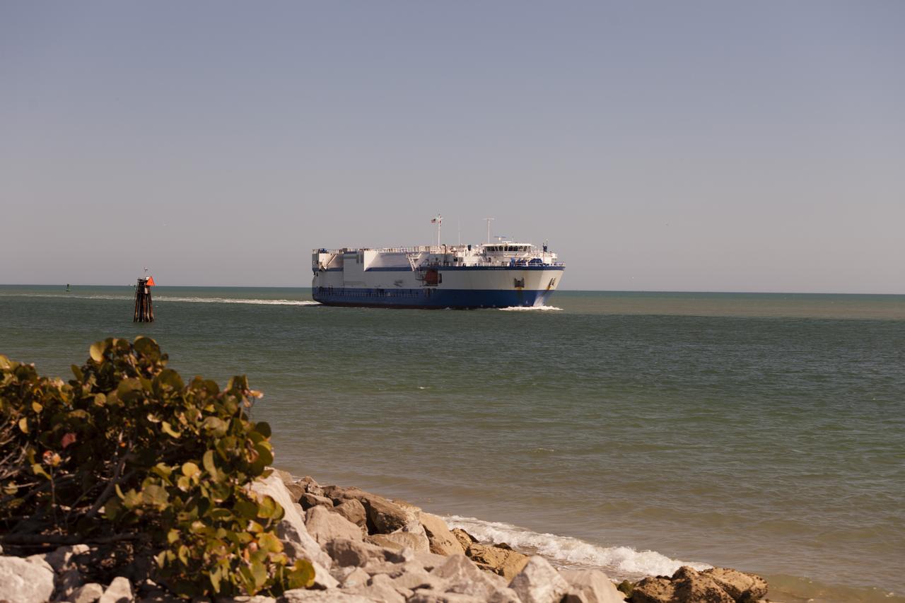 CAPE CANAVERAL, Fla. – The United Launch Alliance barge Delta Mariner enters Port Canaveral in Florida. The barge is carrying two of the booster stages for the Delta IV Heavy rocket slated for Orion's Exploration Flight Test-1, or EFT-1. Orion is the exploration spacecraft designed to carry astronauts to destinations not yet explored by humans. It will have emergency abort capability, sustain the crew during space travel and provide safe re-entry from deep-space return velocities. The first unpiloted test flight of Orion is scheduled to launch in September 2014 atop a Delta IV Heavy rocket and in 2017 on NASA’s Space Launch System rocket. For more information, visit www.nasa.gov/orion. Photo credit: NASA/Frankie Martin