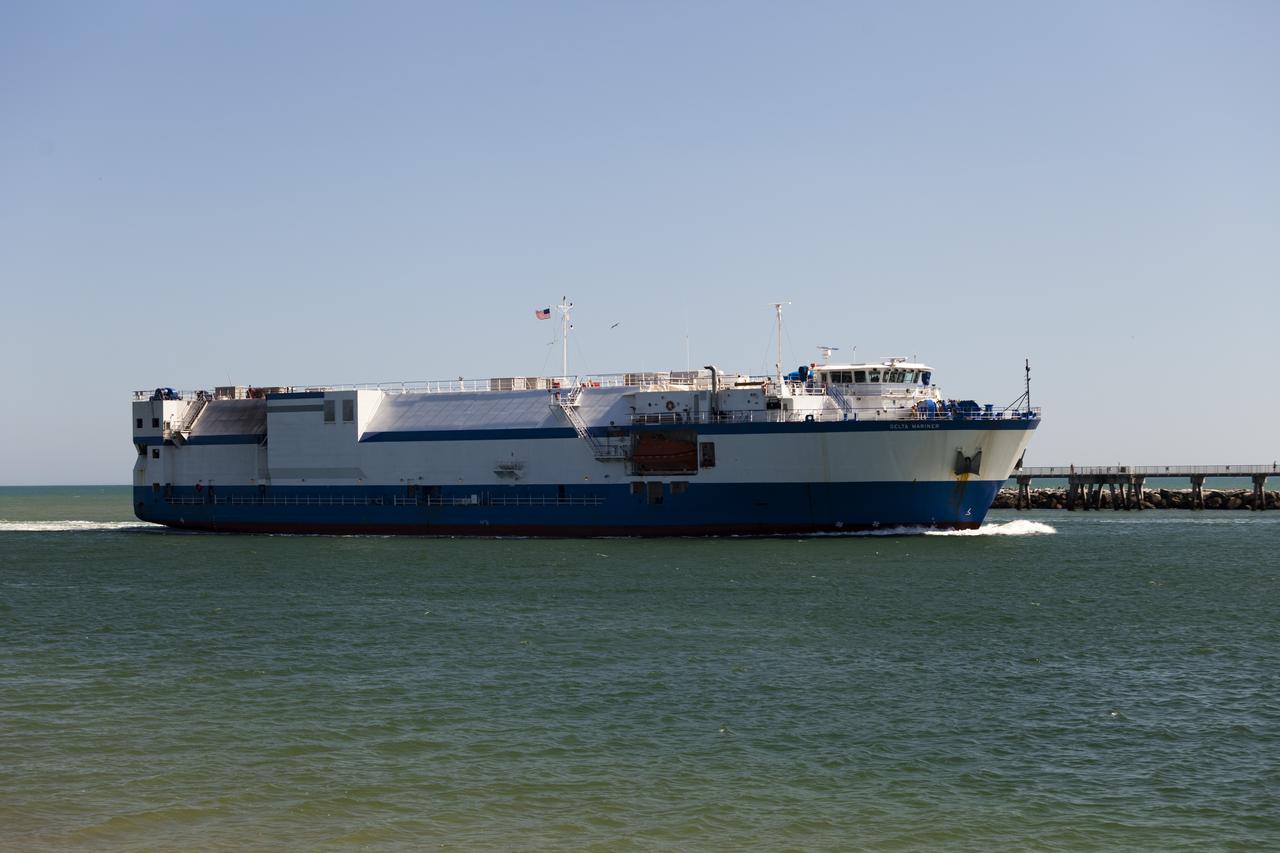 CAPE CANAVERAL, Fla. – The United Launch Alliance barge Delta Mariner glides past the jetties as it enters Port Canaveral in Florida. The barge is carrying two of the booster stages for the Delta IV Heavy rocket slated for Orion's Exploration Flight Test-1, or EFT-1. Orion is the exploration spacecraft designed to carry astronauts to destinations not yet explored by humans. It will have emergency abort capability, sustain the crew during space travel and provide safe re-entry from deep-space return velocities. The first unpiloted test flight of Orion is scheduled to launch in September 2014 atop a Delta IV Heavy rocket and in 2017 on NASA’s Space Launch System rocket. For more information, visit www.nasa.gov/orion. Photo credit: NASA/Frankie Martin