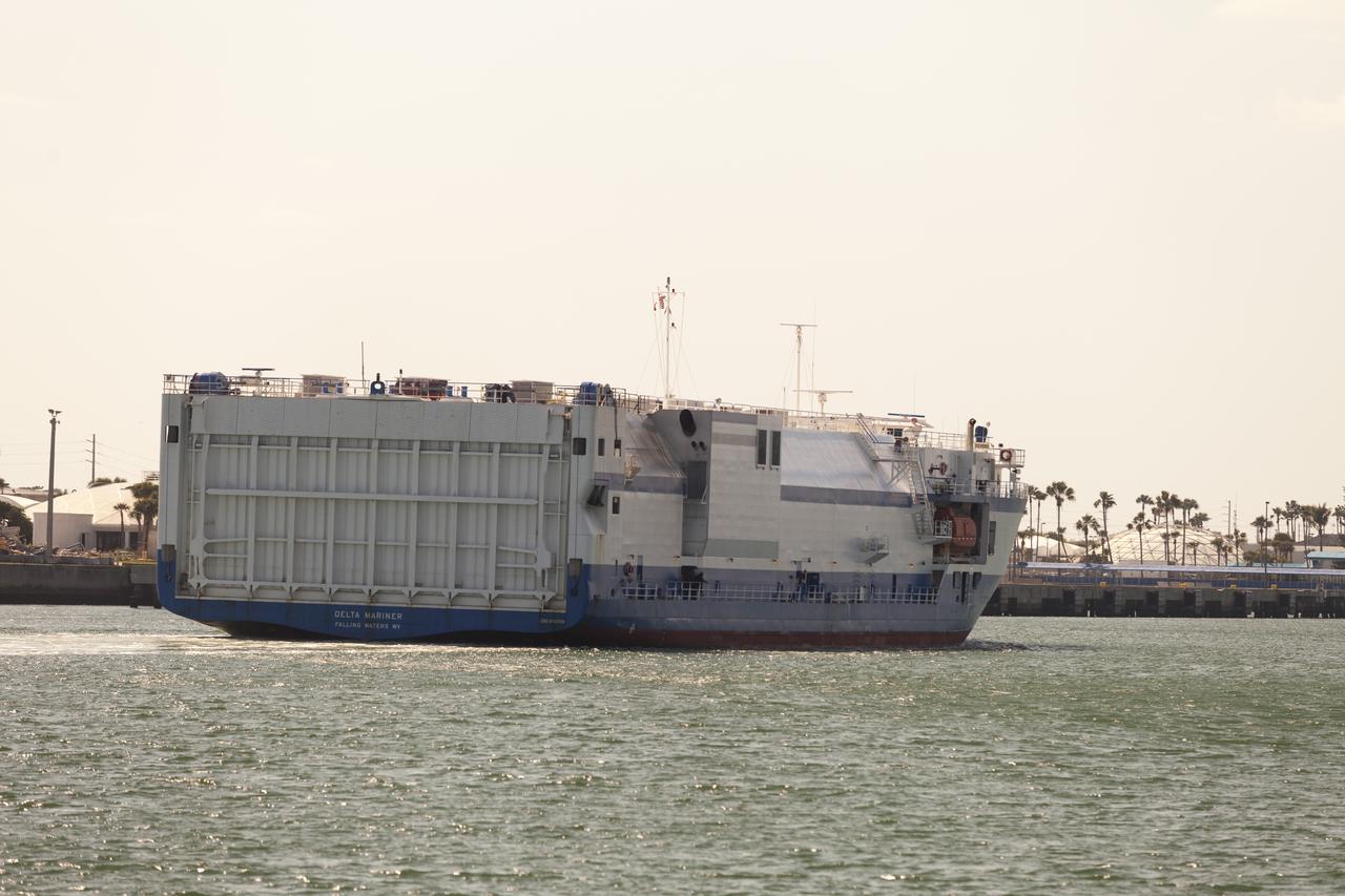 CAPE CANAVERAL, Fla. – The United Launch Alliance barge Delta Mariner travels through Port Canaveral in Florida. The barge is carrying two of the booster stages for the Delta IV Heavy rocket slated for Orion's Exploration Flight Test-1, or EFT-1. Orion is the exploration spacecraft designed to carry astronauts to destinations not yet explored by humans. It will have emergency abort capability, sustain the crew during space travel and provide safe re-entry from deep-space return velocities. The first unpiloted test flight of Orion is scheduled to launch in September 2014 atop a Delta IV Heavy rocket and in 2017 on NASA’s Space Launch System rocket. For more information, visit www.nasa.gov/orion. Photo credit: NASA/Frankie Martin