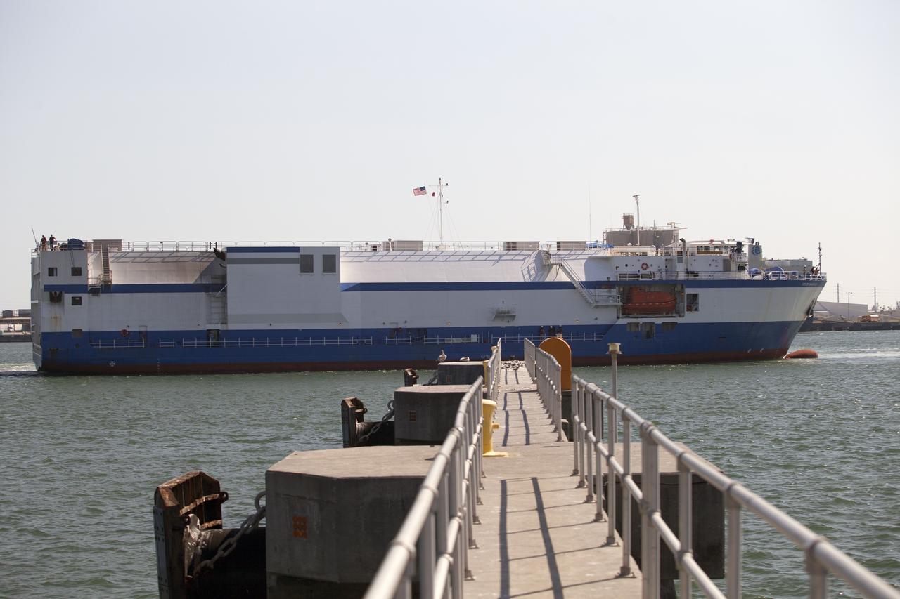 CAPE CANAVERAL, Fla. – The United Launch Alliance barge Delta Mariner nears the dock in Port Canaveral in Florida. The barge is carrying two of the booster stages for the Delta IV Heavy rocket slated for Orion's Exploration Flight Test-1, or EFT-1. Orion is the exploration spacecraft designed to carry astronauts to destinations not yet explored by humans. It will have emergency abort capability, sustain the crew during space travel and provide safe re-entry from deep-space return velocities. The first unpiloted test flight of Orion is scheduled to launch in September 2014 atop a Delta IV Heavy rocket and in 2017 on NASA’s Space Launch System rocket. For more information, visit www.nasa.gov/orion. Photo credit: NASA/Frankie Martin