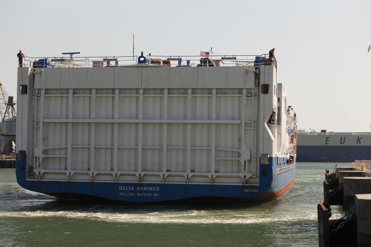 CAPE CANAVERAL, Fla. – The United Launch Alliance barge Delta Mariner prepares to dock in Port Canaveral in Florida. The barge is carrying two of the booster stages for the Delta IV Heavy rocket slated for Orion's Exploration Flight Test-1, or EFT-1. Orion is the exploration spacecraft designed to carry astronauts to destinations not yet explored by humans. It will have emergency abort capability, sustain the crew during space travel and provide safe re-entry from deep-space return velocities. The first unpiloted test flight of Orion is scheduled to launch in September 2014 atop a Delta IV Heavy rocket and in 2017 on NASA’s Space Launch System rocket. For more information, visit www.nasa.gov/orion. Photo credit: NASA/Frankie Martin