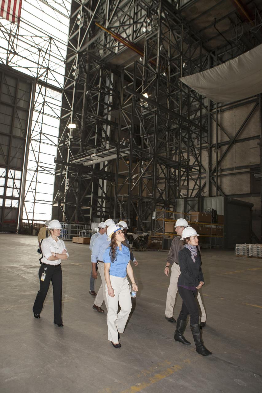 CAPE CANAVERAL, Fla. - NASA astronaut candidates Anne McClain, from left, Christina Hammock, Tyler "Nick" Hague and Jessica Meir walk through the transfer aisle of the Vehicle Assembly Building at NASA's Kennedy Space Center during a daylong set of briefings and tours of different facilities at NASA's primary launch center. The astronaut class of 2013 was selected by NASA after an extensive year-and-a-half search. The new group will help the agency push the boundaries of exploration and travel to new destinations in the solar system. To learn more about the astronaut class of 2013, visit: http://www.nasa.gov/astronauts/2013astroclass.html Photo credit: NASA/Kim Shiflett