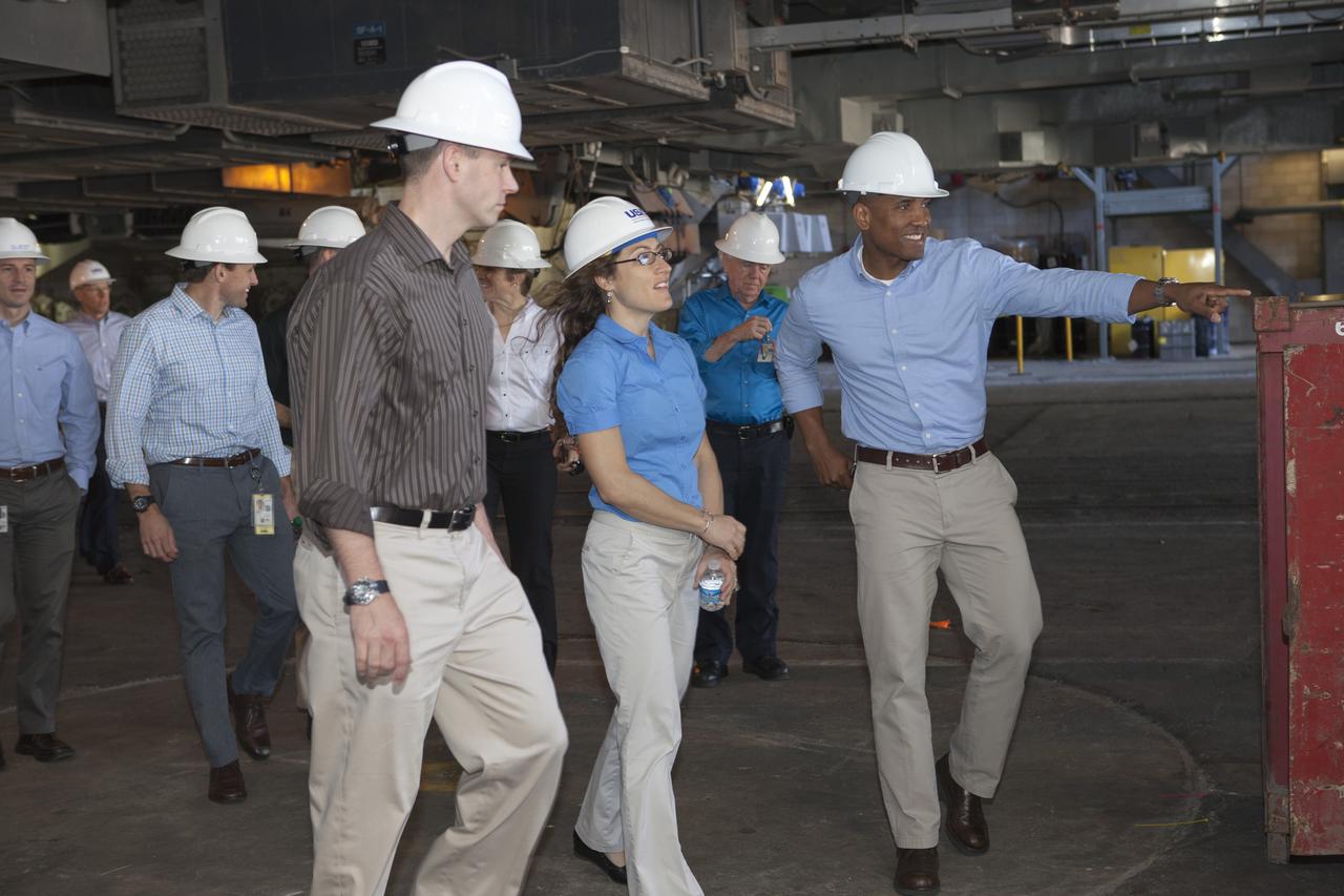 CAPE CANAVERAL, Fla. - NASA astronaut candidates Andrew Morgan, from left Josh Cassada, Tyler "Nick" Hague, Christina Hammock and Victor Glover tour one of the high bays of the Vehicle Assembly Building at NASA's Kennedy Space Center during a daylong set of briefings and tours of different facilities at NASA's primary launch center. The astronaut class of 2013 was selected by NASA after an extensive year-and-a-half search. The new group will help the agency push the boundaries of exploration and travel to new destinations in the solar system. To learn more about the astronaut class of 2013, visit: http://www.nasa.gov/astronauts/2013astroclass.html Photo credit: NASA/Kim Shiflett
