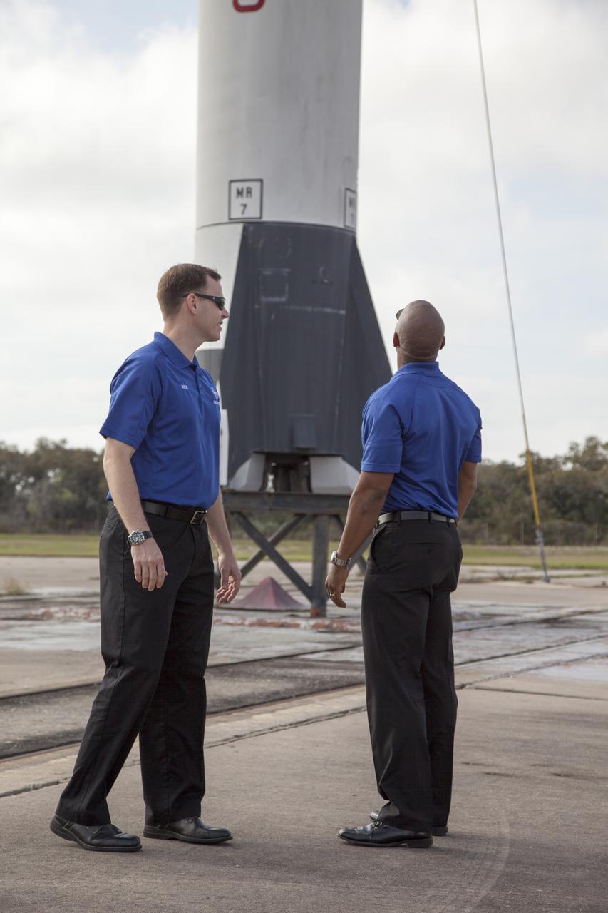 CAPE CANAVERAL, Fla. – NASA astronaut candidates Tyler "Nick" Hague, left, and Victor Glover visit Complex 5/6 at Cape Canaveral Air Force Station in Florida, adjacent to NASA's Kennedy Space Center. The launch pad is the place where Mercury astronaut Alan Shepard lifted off in 196 to become America's first man in space. The astronaut class of 2013 was selected by NASA after an extensive year-and-a-half search. The new group will help the agency push the boundaries of exploration and travel to new destinations in the solar system. To learn more about the astronaut class of 2013, visit: http://www.nasa.gov/astronauts/2013astroclass.html Photo credit: NASA/Frankie Martin