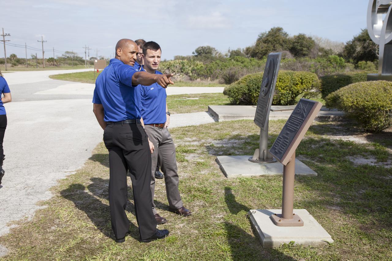CAPE CANAVERAL, Fla. – NASA astronaut candidates Victor Glover and Andrew Morgan discuss markers at the entrance to Complex 14 at Cape Canaveral Air Force Station in Florida, adjacent to NASA's Kennedy Space Center. Complex 14 served as the launch pad for Mercury astronaut John Glenn when he lifted off in 1962 to orbit the Earth, becoming the first American to do so. The astronaut class of 2013 was selected by NASA after an extensive year-and-a-half search. The new group will help the agency push the boundaries of exploration and travel to new destinations in the solar system. To learn more about the astronaut class of 2013, visit: http://www.nasa.gov/astronauts/2013astroclass.html Photo credit: NASA/Frankie Martin