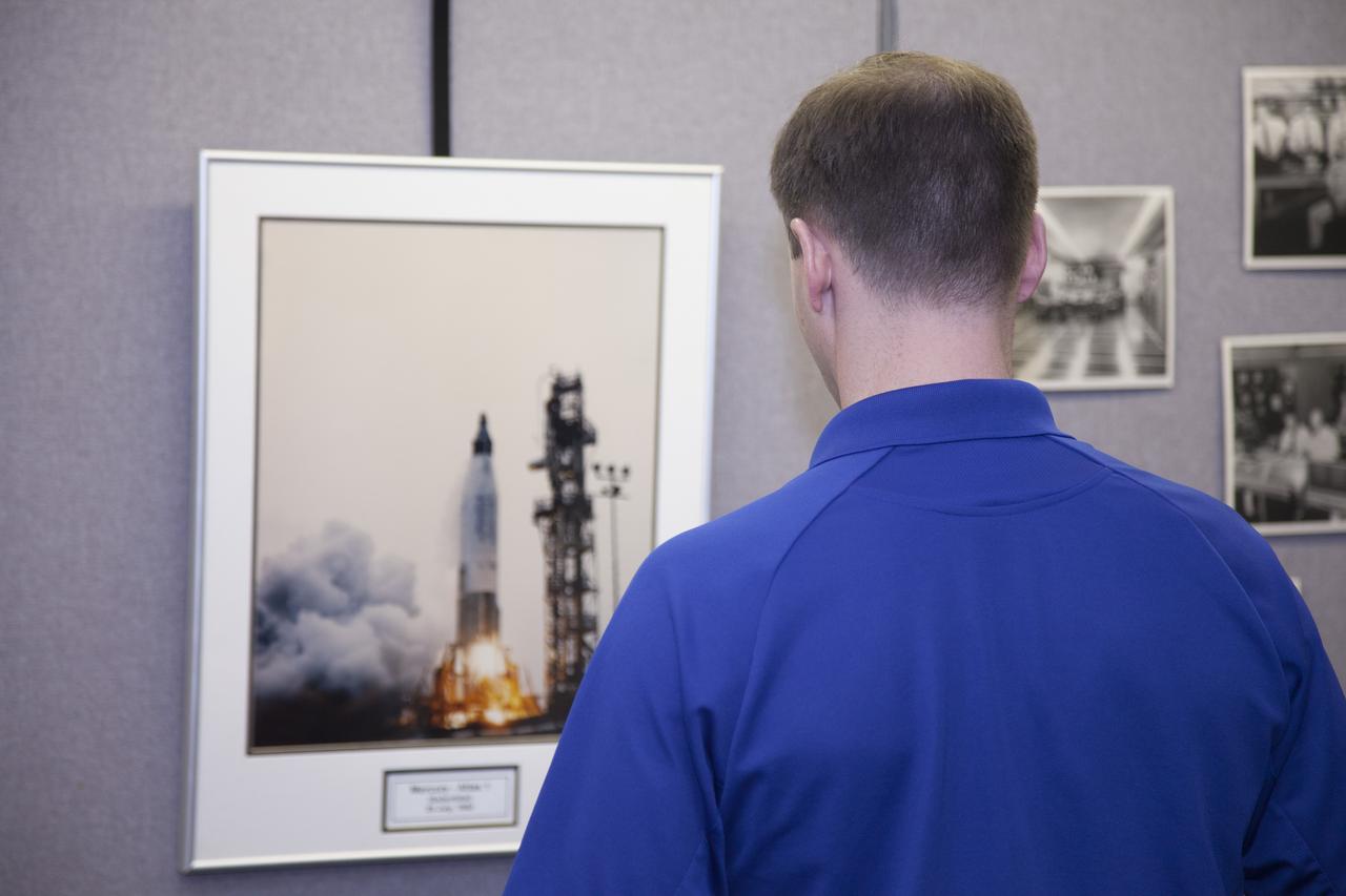 CAPE CANAVERAL, Fla. – NASA astronaut candidate Tyler "Nick" Hague looks over photos inside the blockhouse at Complex 14 at Cape Canaveral Air Force Station in Florida, adjacent to NASA's Kennedy Space Center. Complex 14 served as the launch pad for Mercury astronaut John Glenn when he lifted off in 1962 to orbit the Earth, becoming the first American to do so. The astronaut class of 2013 was selected by NASA after an extensive year-and-a-half search. The new group will help the agency push the boundaries of exploration and travel to new destinations in the solar system. To learn more about the astronaut class of 2013, visit: http://www.nasa.gov/astronauts/2013astroclass.html Photo credit: NASA/Frankie Martin