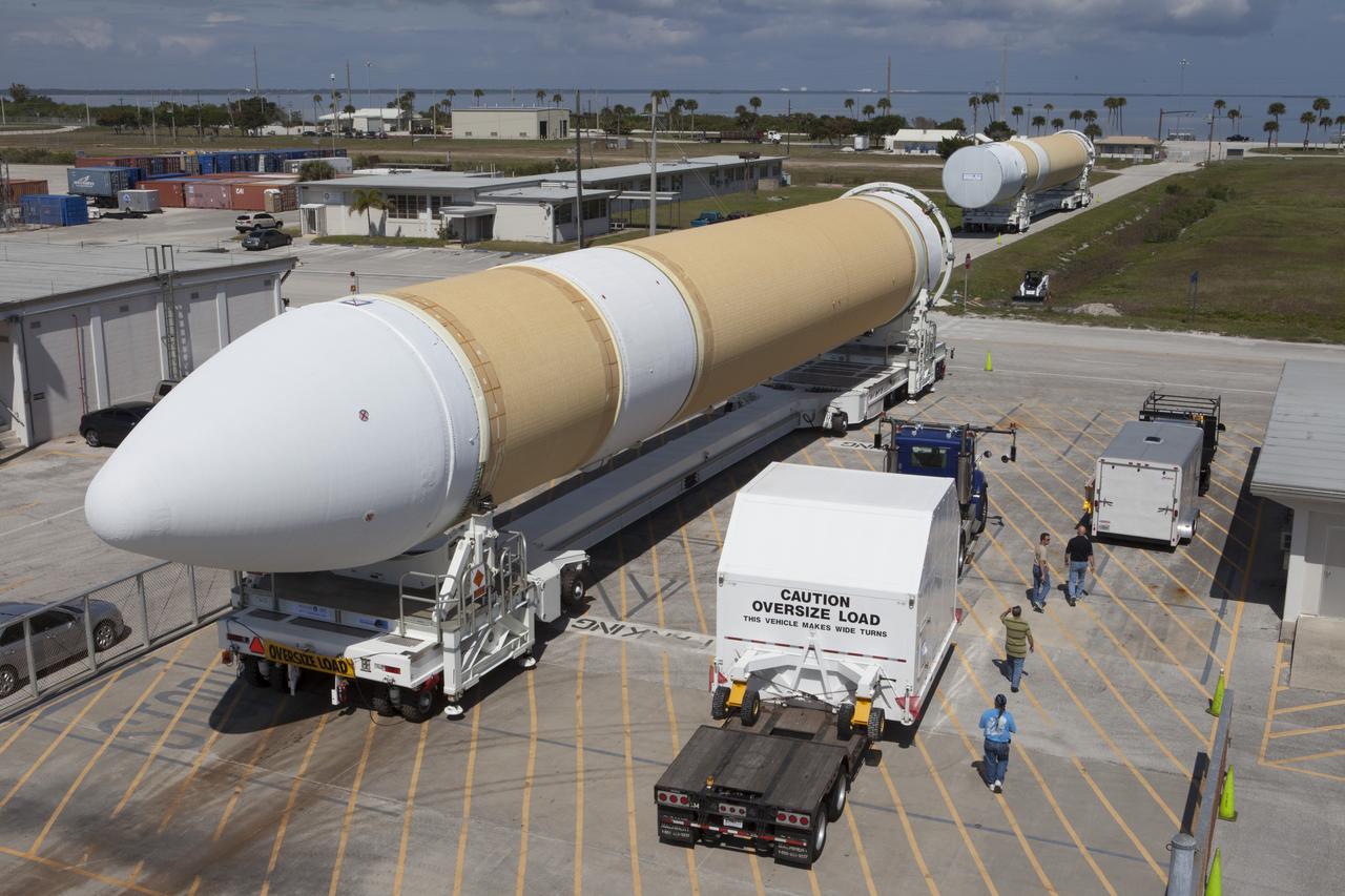 CAPE CANAVERAL, Fla. – Two of the three United Launch Alliance Delta IV heavy boosters for NASA’s upcoming Exploration Flight Test-1, or EFT-1, mission with the Orion spacecraft, arrived by barge at the U.S. Army Outpost wharf at Port Canaveral in Florida. The core booster and starboard booster have been offloaded and will be transported to the Horizontal Integration Facility, or HIF, at Space Launch Complex 37 on Cape Canaveral Air Force Station. The port booster and the upper stage are planned to be shipped to Cape Canaveral in April. At the HIF, all three boosters will be processed and checked out before being moved to the nearby launch pad and hoisted into position. During the EFT-1 mission, Orion will travel farther into space than any human spacecraft has gone in more than 40 years. The data gathered during the flight will influence design decisions, validate existing computer models and innovative new approaches to space systems development, as well as reduce overall mission risks and costs for later Orion flights. Liftoff of Orion on EFT-1 is planned for fall 2014. Photo credit: NASA/Kim Shiflett