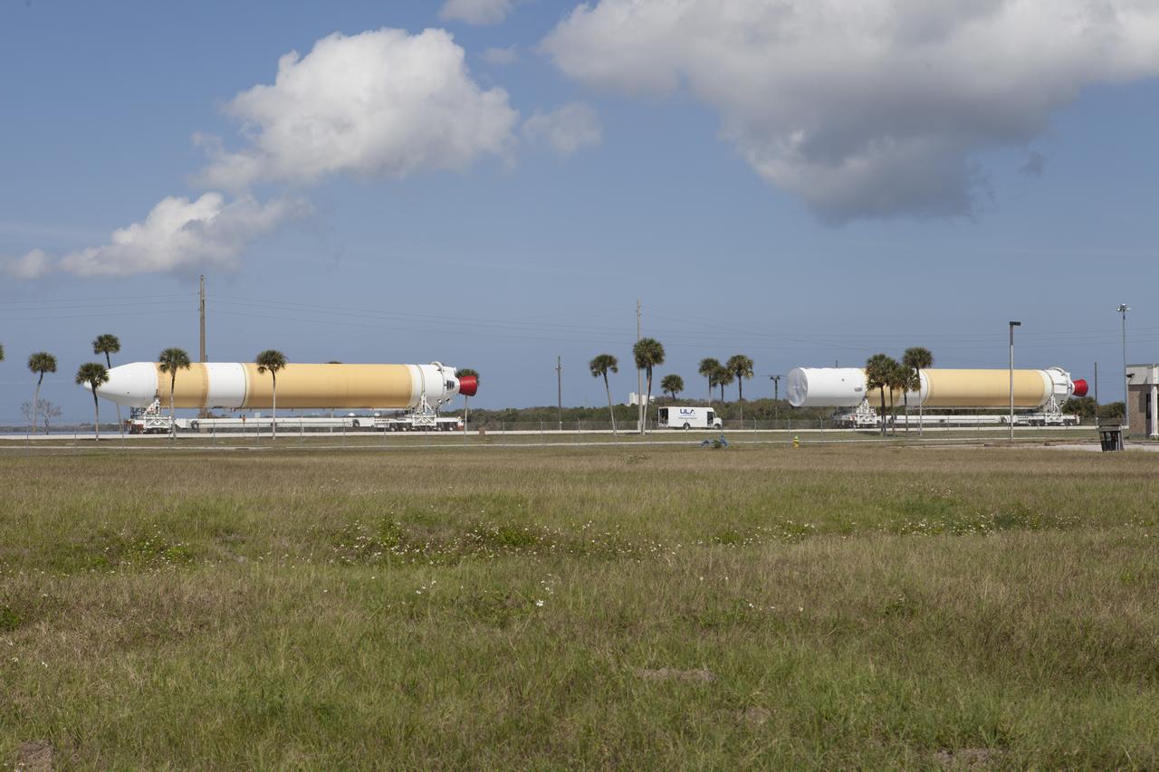 CAPE CANAVERAL, Fla. – Two of the three United Launch Alliance Delta IV heavy boosters for NASA’s upcoming Exploration Flight Test-1, or EFT-1, mission with the Orion spacecraft, arrived by barge at the U.S. Army Outpost wharf at Port Canaveral in Florida. The core booster and starboard booster were offloaded and are being transported to the Horizontal Integration Facility, or HIF, at Space Launch Complex 37 on Cape Canaveral Air Force Station. The port booster and the upper stage are planned to be shipped to Cape Canaveral in April. At the HIF, all three boosters will be processed and checked out before being moved to the nearby launch pad and hoisted into position. During the EFT-1 mission, Orion will travel farther into space than any human spacecraft has gone in more than 40 years. The data gathered during the flight will influence design decisions, validate existing computer models and innovative new approaches to space systems development, as well as reduce overall mission risks and costs for later Orion flights. Liftoff of Orion on EFT-1 is planned for fall 2014. Photo credit: NASA/Kim Shiflett