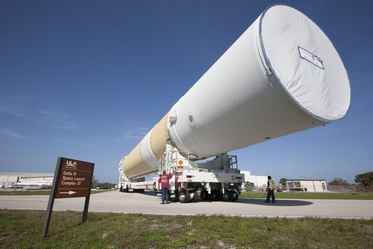 CAPE CANAVERAL, Fla. – Two of the three United Launch Alliance Delta IV heavy boosters for NASA’s upcoming Exploration Flight Test-1, or EFT-1, mission with the Orion spacecraft, arrived by barge at the U.S. Army Outpost wharf at Port Canaveral in Florida. The core booster and starboard booster were offloaded and are being transported to the Horizontal Integration Facility, or HIF, at Space Launch Complex 37 on Cape Canaveral Air Force Station. The port booster and the upper stage are planned to be shipped to Cape Canaveral in April. At the HIF, all three boosters will be processed and checked out before being moved to the nearby launch pad and hoisted into position. During the EFT-1 mission, Orion will travel farther into space than any human spacecraft has gone in more than 40 years. The data gathered during the flight will influence design decisions, validate existing computer models and innovative new approaches to space systems development, as well as reduce overall mission risks and costs for later Orion flights. Liftoff of Orion on EFT-1 is planned for fall 2014. Photo credit: NASA/Kim Shiflett