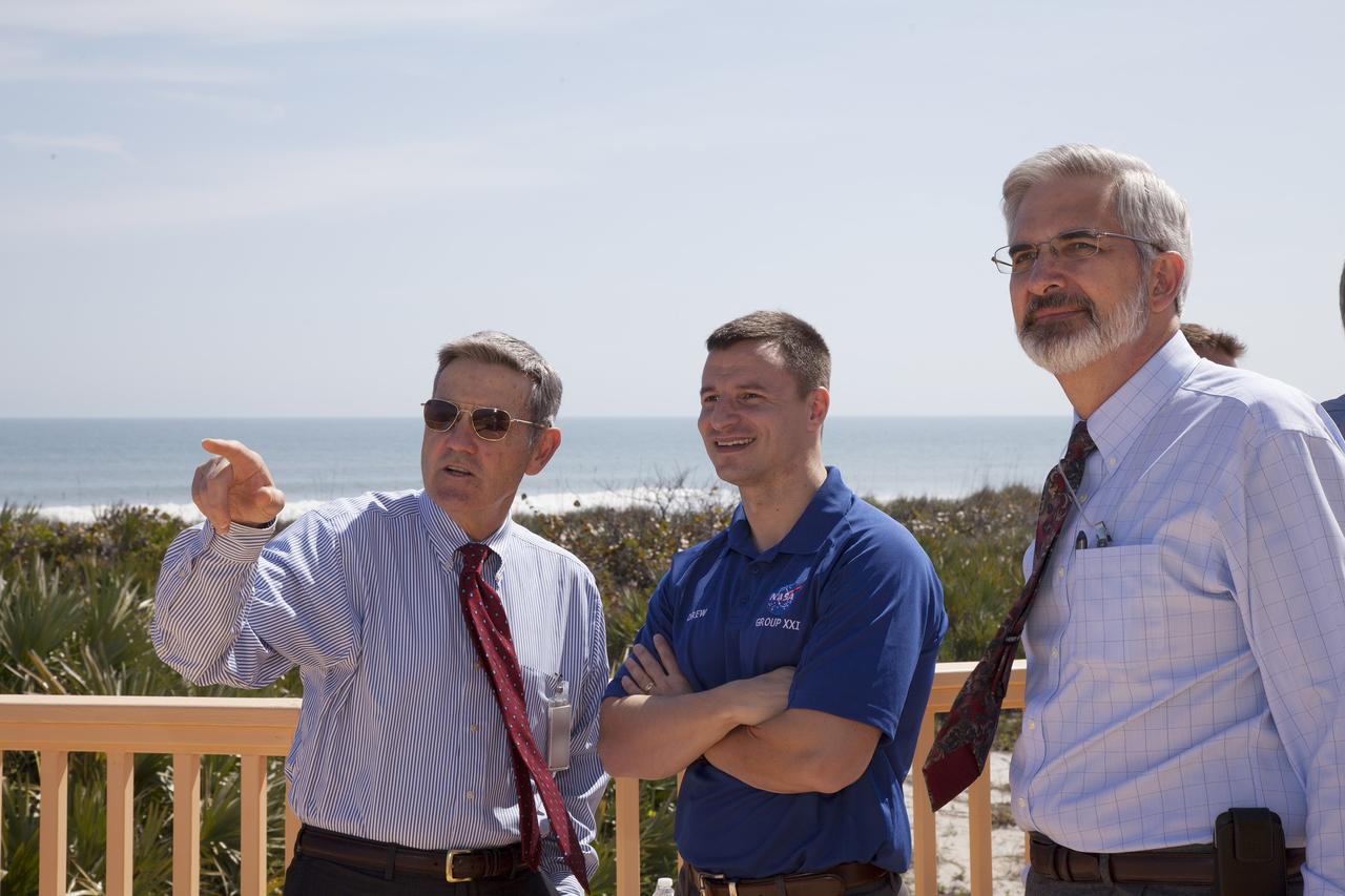 CAPE CANAVERAL, Fla. – Bob Cabana, director of NASA's Kennedy Space Center and a former space shuttle commander, points out landmarks of the space center to astronaut candidate Andrew Morgan during a visit to the Beach House at Kennedy. The Beach House is a traditional gathering place for astronauts before they fly into space. The astronaut class of 2013 was selected by NASA after an extensive year-and-a-half search. The new group will help the agency push the boundaries of exploration and travel to new destinations in the solar system. To learn more about the astronaut class of 2013, visit: http://www.nasa.gov/astronauts/2013astroclass.html Photo credit: NASA/Daniel Casper