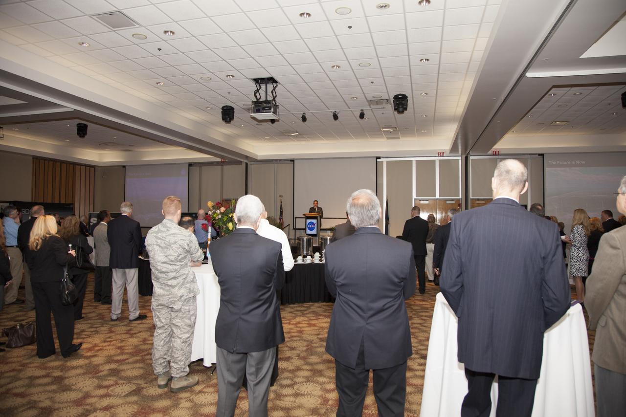 CAPE CANAVERAL, Fla. – NASA Kennedy Space Center Director Robert Cabana addresses the community leaders, business executives, educators, community organizers, and state and local government leaders attending the Kennedy Space Center Director in the Kennedy Space Center Visitor Complex Debus Center. Attendees talked with Cabana and other senior Kennedy managers and visited displays featuring updates on Kennedy programs and projects, including International Space Station, Commercial Crew, Ground System Development and Operations, Launch Services, Center Planning and Development, Technology, KSC Swamp Works and NASA Education. The morning concluded with a tour of the new Space Shuttle Atlantis exhibit at the visitor complex. For more information, visit http://www.nasa.gov/kennedy. Photo credit: NASA/Daniel Casper