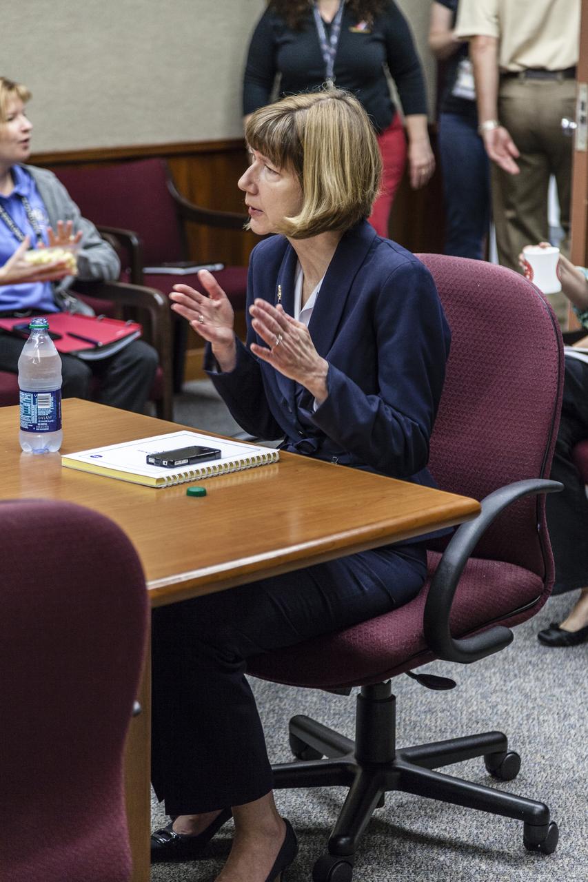 CAPE CANAVERAL, Fla. - Kathy Lueders, manager of NASA's Commercial Crew Program, discusses program progress during a meeting with the staff at NASA's Kennedy Space Center in Florida. Photo credit: NASA/Frankie Martin