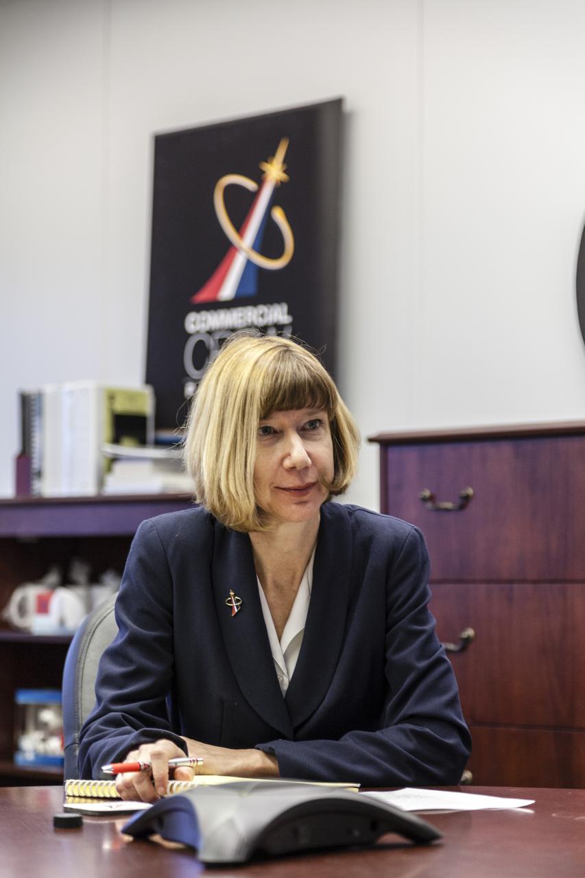 CAPE CANAVERAL, Fla. - Kathy Lueders, manager of NASA's Commercial Crew Program, listens to updates from program engineers at NASA's Kennedy Space Center in Florida. Photo credit: NASA/Frankie Martin