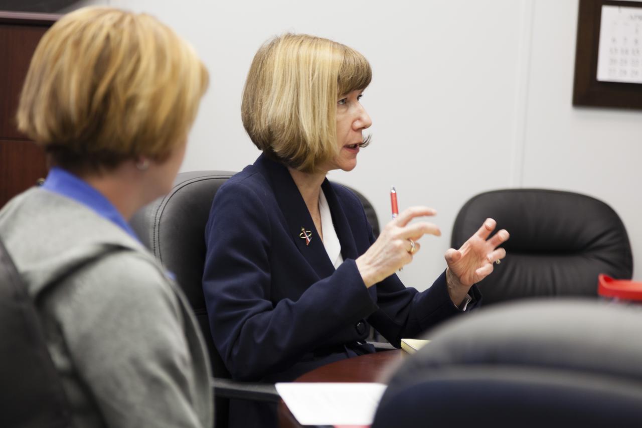 CAPE CANAVERAL, Fla. - Kathy Lueders, manager of NASA's Commercial Crew Program, listens to updates from program engineers at NASA's Kennedy Space Center in Florida. Photo credit: NASA/Frankie Martin