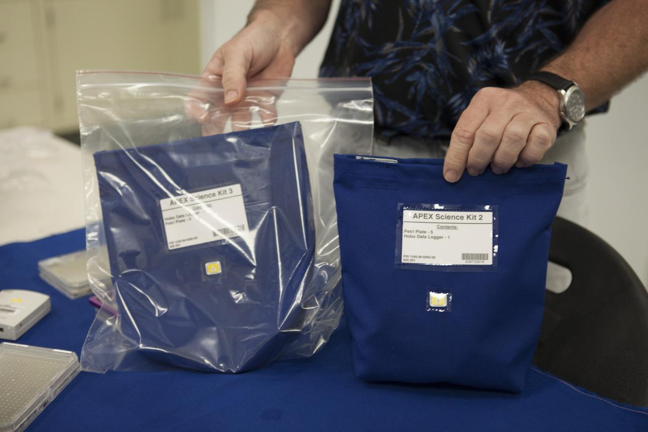 CAPE CANAVERAL, Fla. - In the Space Station Processing Facility at NASA's Kennedy Space Center in Florida, portions of the Advanced Plant Experiment, or APEX, experiment are checked out as it is prepared for launch to the International Space Station aboard a SpaceX Dragon spacecraft. Scheduled for launch on March 16 atop a Falcon 9 rocket, Dragon will be marking its fourth trip to the space station. The SpaceX-3 mission is the third of 12 flights contracted by NASA to resupply the orbiting laboratory. For more information, visit http://www.nasa.gov/mission_pages/station/structure/launch/index.html Photo credit: NASA/Kim Shiflett
