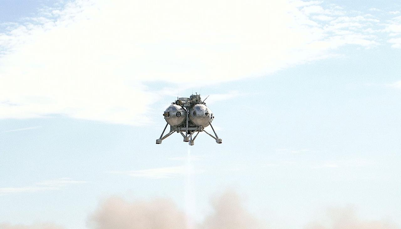 CAPE CANAVERAL, Fla. - The Project Morpheus prototype lander soars high on its seventh free flight test at the north end of the Shuttle Landing Facility at NASA’s Kennedy Space Center in Florida. The 83-second test began at 3:41 p.m. EDT with the Morpheus lander launching from the ground over a flame trench and ascending to 580 feet, its highest to date. Morpheus then flew its fastest downrange trek at 30 mph, travelling farther than before, 837 feet. The lander performed a 42-foot divert to emulate a hazard avoidance maneuver before descending and touching down on Landing Site 2, at the northern landing pad inside the automated landing and hazard avoidance technology ALHAT hazard field. Morpheus landed within one foot of its intended target. Project Morpheus tests NASA’s ALHAT and an engine that runs on liquid oxygen and methane, or green propellants, into a fully-operational lander that could deliver cargo to other planetary surfaces. The landing facility provides the lander with the kind of field necessary for realistic testing, complete with rocks, craters and hazards to avoid. Morpheus’ ALHAT payload allows it to navigate to clear landing sites amidst rocks, craters and other hazards during its descent. Project Morpheus is being managed under the Advanced Exploration Systems, or AES, Division in NASA’s Human Exploration and Operations Mission Directorate. The efforts in AES pioneer new approaches for rapidly developing prototype systems, demonstrating key capabilities and validating operational concepts for future human missions beyond Earth orbit. For more information on Project Morpheus, visit http://morpheuslander.jsc.nasa.gov/. Photo credit: NASA/Mike Chambers