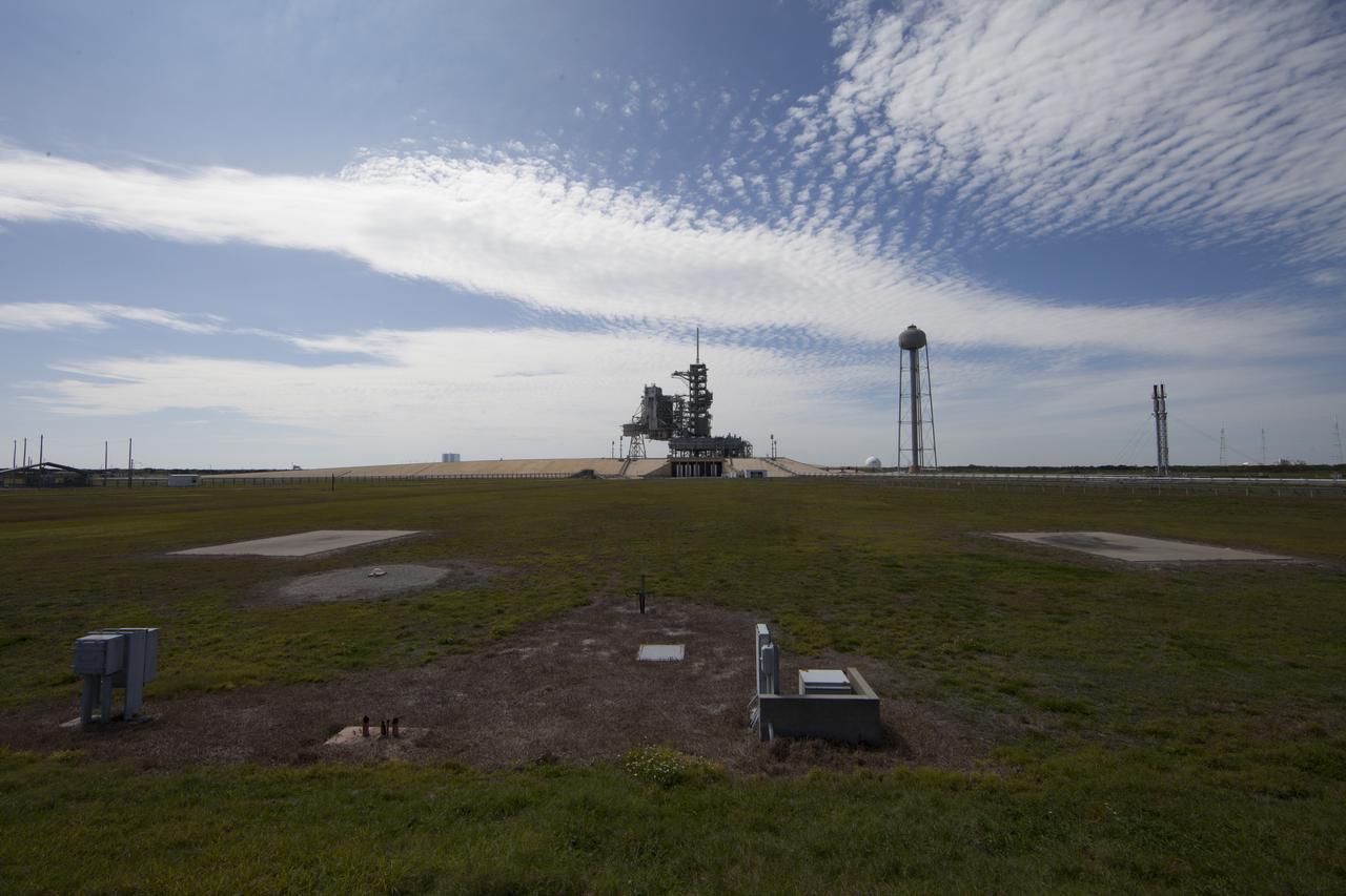 CAPE CANAVERAL, Fla. -- At NASA's Kennedy Space Center in Florida, launch pad 39A looks much like it did after the liftoff of STS-135, the final space shuttle mission, on July 8, 2011. Both launch pad 39A and 39B pad 39A was originally built for the Apollo/Saturn V rockets that launched American astronauts on their historic journeys to the moon and later modified to support the 30-year shuttle program. To learn more about Launch Pad 39A visit: http://www.nasa.gov/mission_pages/shuttle/launch/launch-complex39-toc.html Photo credit: NASA/Dan Casper