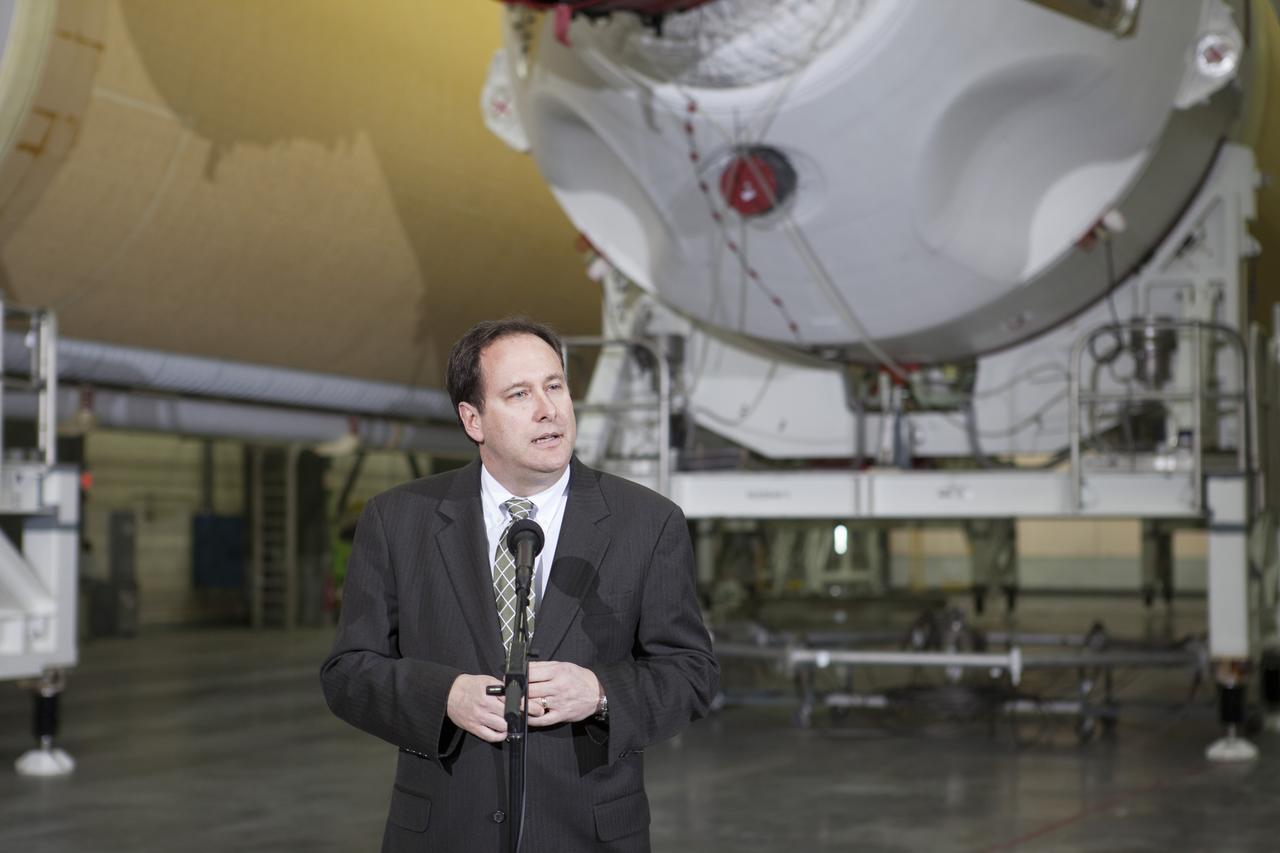 CAPE CANAVERAL, Fla. – During a media event inside the Horizontal Integration Facility at Launch Complex 37 at Cape Canaveral Air Force Station in Florida, NASA Associate Administrator Robert Lightfoot speaks to members of the media. Also attending the briefing were Kennedy Space Center Director Bob Cabana and Tony Taliancich, director of East Coast Launch Operations with United Launch Alliance, or ULA. The event was held to showcase two of the ULA Delta IV boosters for the Orion Exploration Flight Test-1, or EFT-1, mission. Orion is the exploration spacecraft designed to carry astronauts to destinations not yet explored by humans, including an asteroid and Mars. It will have emergency abort capability, sustain the crew during space travel and provide safe re-entry from deep space return velocities. The first unpiloted test flight of Orion, EFT-1, is scheduled to launch in 2014 atop a Delta IV rocket and in 2017 on NASA’s Space Launch System rocket. For more information, visit http://www.nasa.gov/orion. Photo credit: NASA/Kim Shiflett