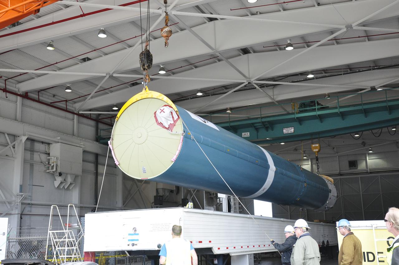 VANDENBERG AIR FORCE BASE, Calif. – The Delta first-stage booster for NASA's Orbiting Carbon Observatory-2 mission, or OCO-2, is lifted from its transportation trailer in the Building 836 hangar at Space Launch Complex 2 on Vandenberg Air Force Base in California. OCO-2 is scheduled to launch aboard a United Launch Alliance Delta II rocket in July. The observatory will collect precise global measurements of carbon dioxide in the Earth's atmosphere and provide scientists with a better idea of the chemical compound's impacts on climate change. Scientists will analyze this data to improve our understanding of the natural processes and human activities that regulate the abundance and distribution of this important atmospheric gas. To learn more about OCO-2, visit http://oco.jpl.nasa.gov. Photo credit: NASA/Randy Beaudoin