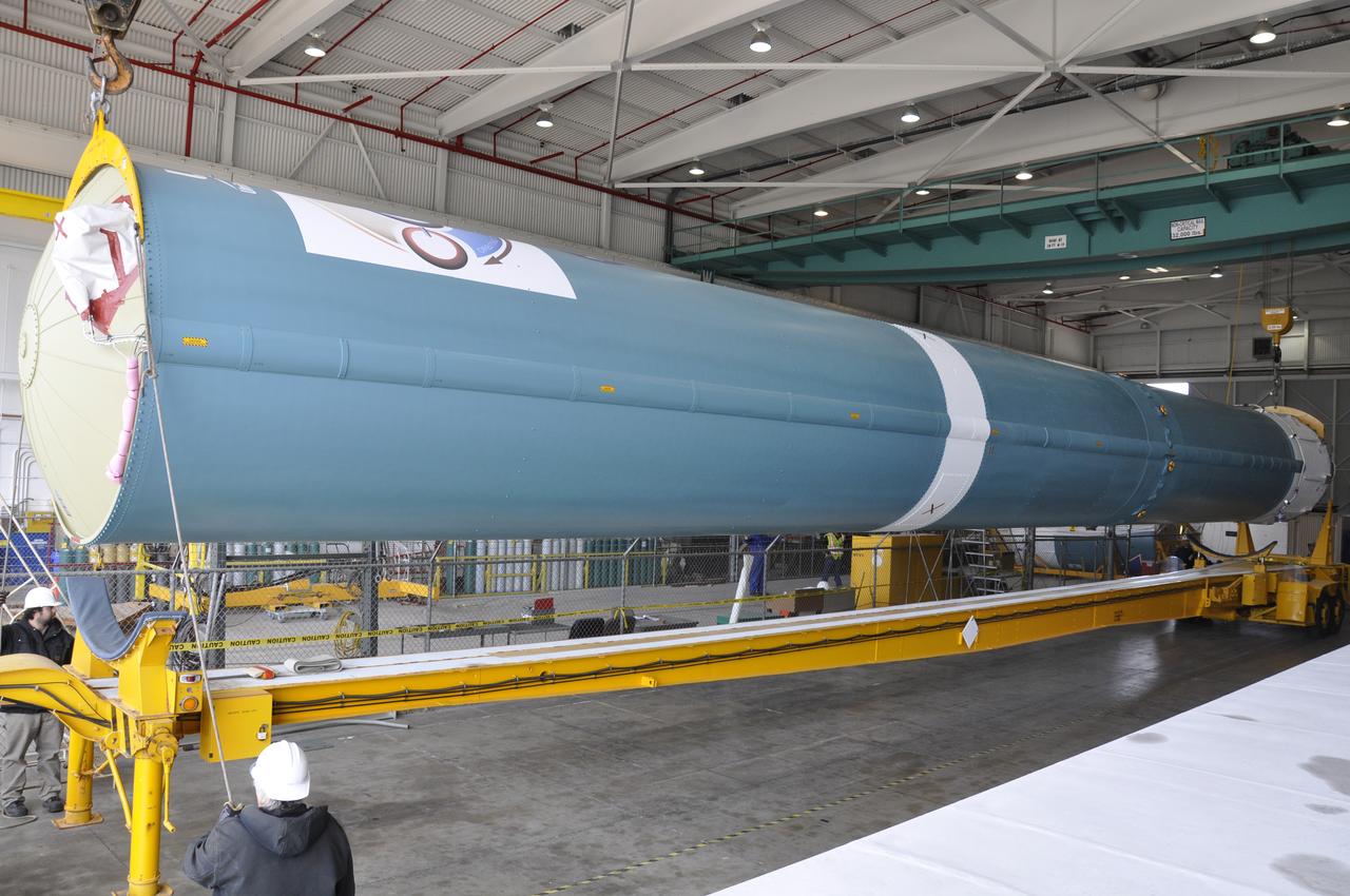 VANDENBERG AIR FORCE BASE, Calif. – The Delta first-stage booster for NASA's Orbiting Carbon Observatory-2 mission, or OCO-2, is lowered onto a transportation hardware cradle in the Building 836 hangar at Space Launch Complex 2 on Vandenberg Air Force Base in California. OCO-2 is scheduled to launch aboard a United Launch Alliance Delta II rocket in July. The observatory will collect precise global measurements of carbon dioxide in the Earth's atmosphere and provide scientists with a better idea of the chemical compound's impacts on climate change. Scientists will analyze this data to improve our understanding of the natural processes and human activities that regulate the abundance and distribution of this important atmospheric gas. To learn more about OCO-2, visit http://oco.jpl.nasa.gov. Photo credit: NASA/Randy Beaudoin