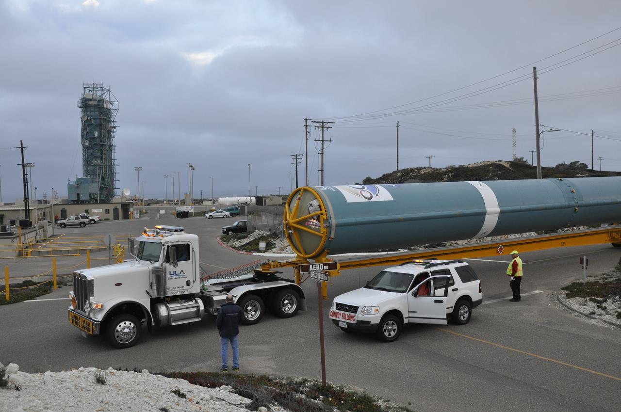 VANDENBERG AIR FORCE BASE, Calif. – The Delta first-stage booster for NASA's Orbiting Carbon Observatory-2 mission, or OCO-2, arrives at the Horizontal Processing Facility at Space Launch Complex 2 on Vandenberg Air Force Base in California. OCO-2 is scheduled to launch aboard a United Launch Alliance Delta II rocket in July. The observatory will collect precise global measurements of carbon dioxide in the Earth's atmosphere and provide scientists with a better idea of the chemical compound's impacts on climate change. Scientists will analyze this data to improve our understanding of the natural processes and human activities that regulate the abundance and distribution of this important atmospheric gas. To learn more about OCO-2, visit http://oco.jpl.nasa.gov. Photo credit: NASA/Randy Beaudoin