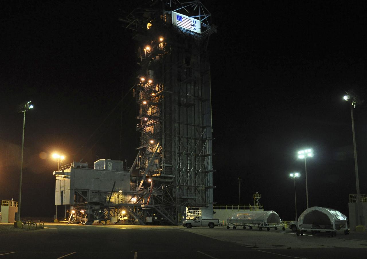 VANDENBERG AIR FORCE BASE, Calif. – Both halves of the fairing for NASA's Orbiting Carbon Observatory-2 mission, or OCO-2, are delivered to Space Launch Complex 2 on Vandenberg Air Force Base in California. Operations have begun to hoist the sections of the fairing into the Delta II launcher's environmental enclosure, or clean room, at the top of the pad's tower. The fairing will protect OCO-2 during launch aboard a United Launch Alliance Delta II rocket from Space Launch Complex 2 in July. The observatory will collect precise global measurements of carbon dioxide in the Earth's atmosphere and provide scientists with a better idea of the chemical compound's impacts on climate change. Scientists will analyze this data to improve our understanding of the natural processes and human activities that regulate the abundance and distribution of this important atmospheric gas. To learn more about OCO-2, visit http://oco.jpl.nasa.gov. Photo credit: NASA/Randy Beaudoin
