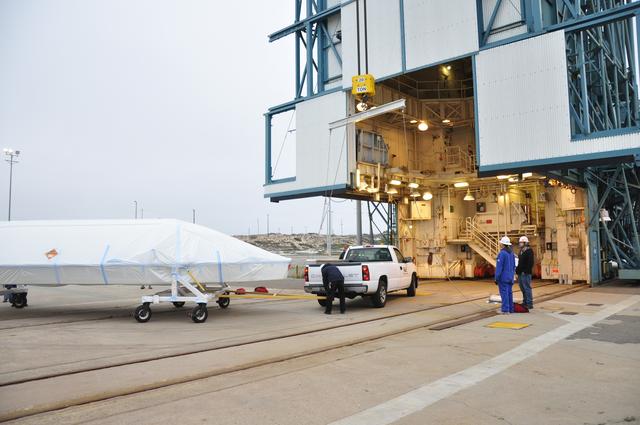 NASA image: OCO-2: Hoisting the Fairing Halves up the MST
