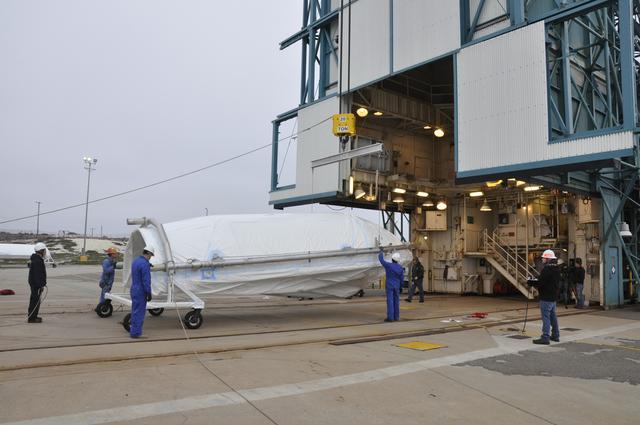 NASA image: OCO-2: Hoisting the Fairing Halves up the MST