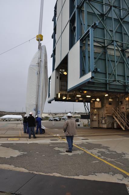 NASA image: OCO-2: Hoisting the Fairing Halves up the MST