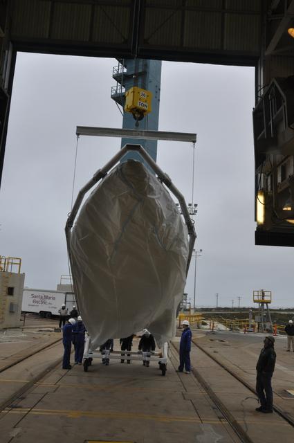 NASA image: OCO-2: Hoisting the Fairing Halves up the MST