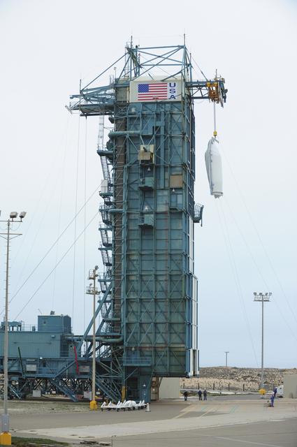 NASA image: OCO-2 Fairings being hoisted into MST