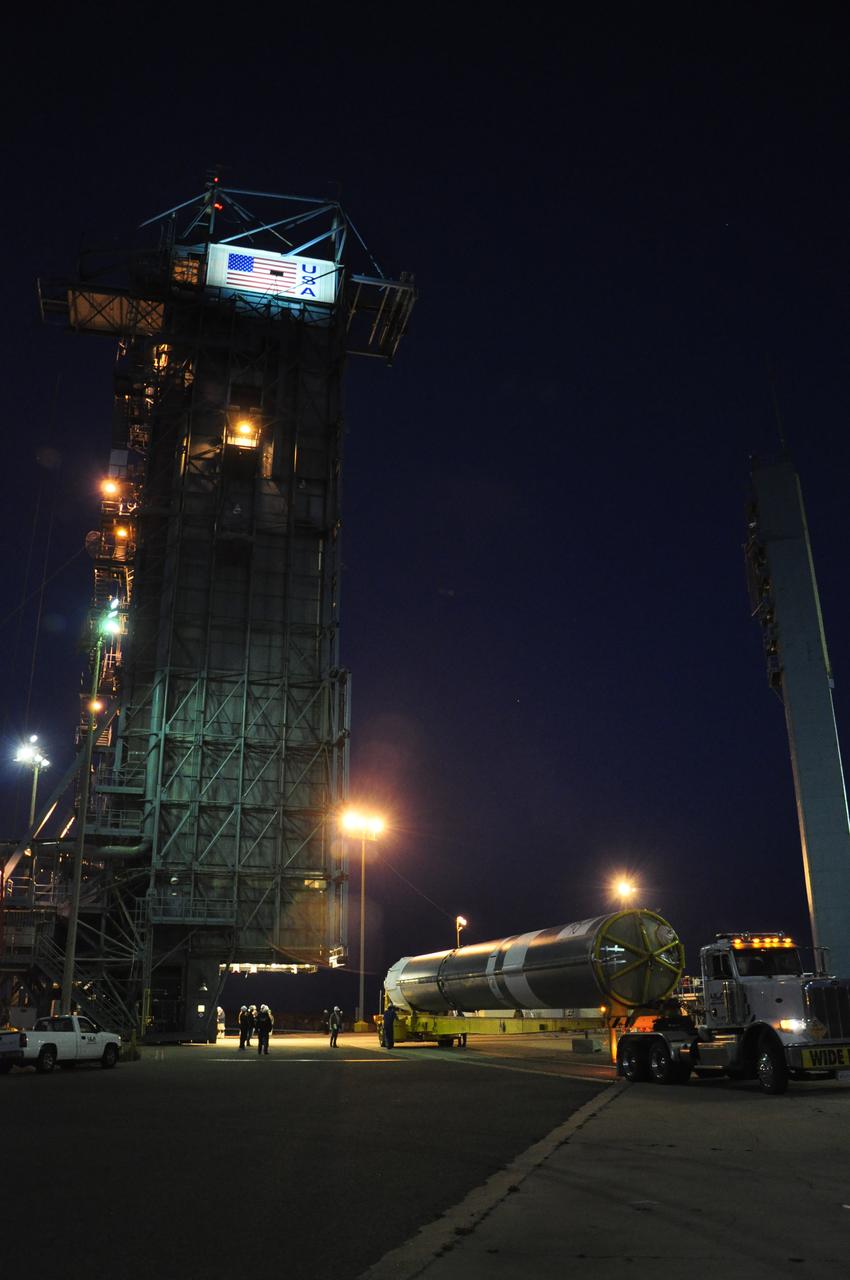 VANDENBERG AIR FORCE BASE, Calif. – The United Launch Alliance Delta II rocket for NASA's Orbiting Carbon Observatory-2 mission, or OCO-2, is positioned next to the mobile service tower at Space Launch Complex 2 on Vandenberg Air Force Base in California. Launch is scheduled for July 2014. The observatory will collect precise global measurements of carbon dioxide in the Earth's atmosphere and provide scientists with a better idea of the chemical compound's impacts on climate change. Scientists will analyze this data to improve our understanding of the natural processes and human activities that regulate the abundance and distribution of this important atmospheric gas. To learn more about OCO-2, visit http://oco.jpl.nasa.gov. Photo credit: NASA/Randy Beaudoin